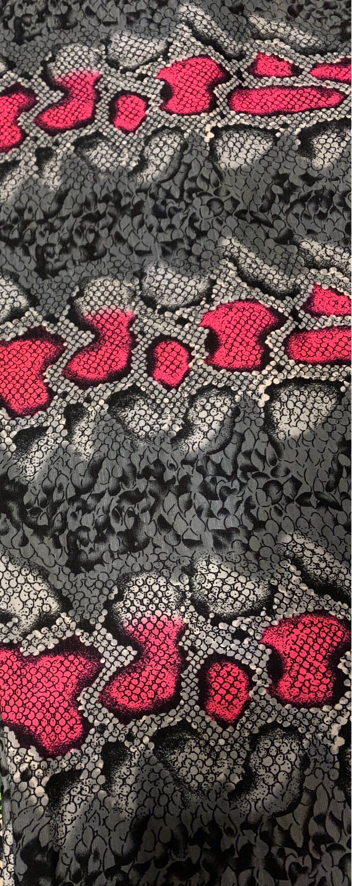 New skin snake design poly power mesh 4-stretch it glows in the dark with black light 58/60” Sold by the YD. Ships Worldwide LA.CA