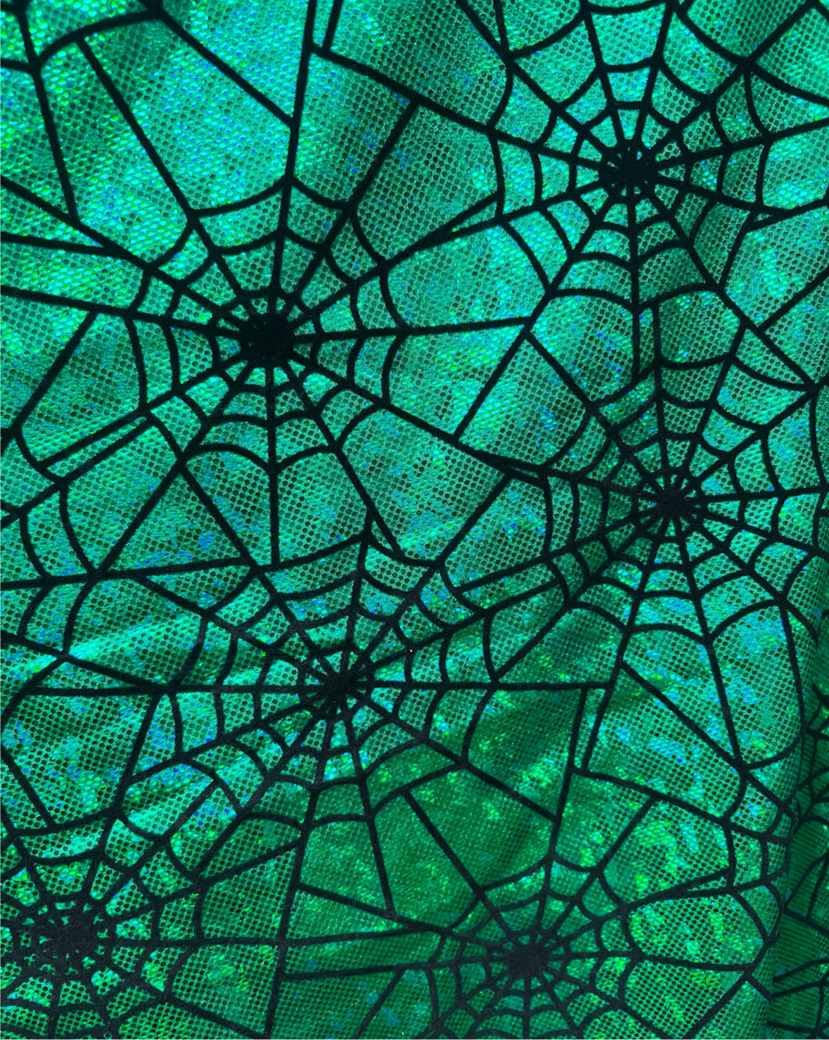 New Spiderwebs design print on hologram metallic nylon spandex with flocking 4-way stretch 58/60”sold by the YD.Ships worldwide from LA USA.