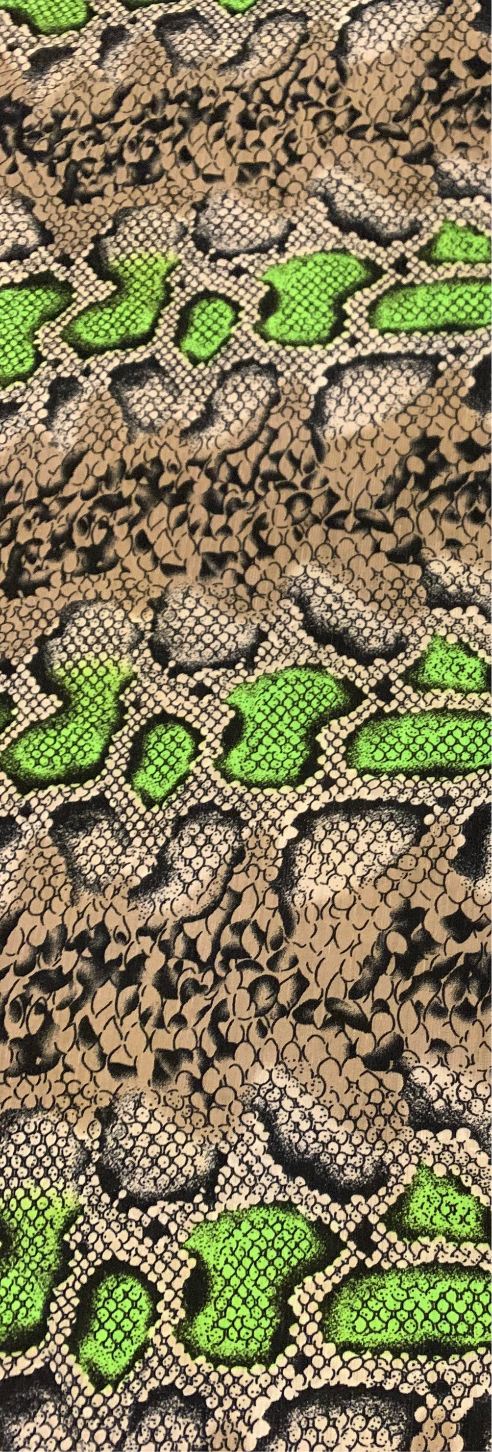 New skin snake design poly power mesh 4-stretch it glows in the dark with black light 58/60” Sold by the YD. Ships Worldwide LA.CA