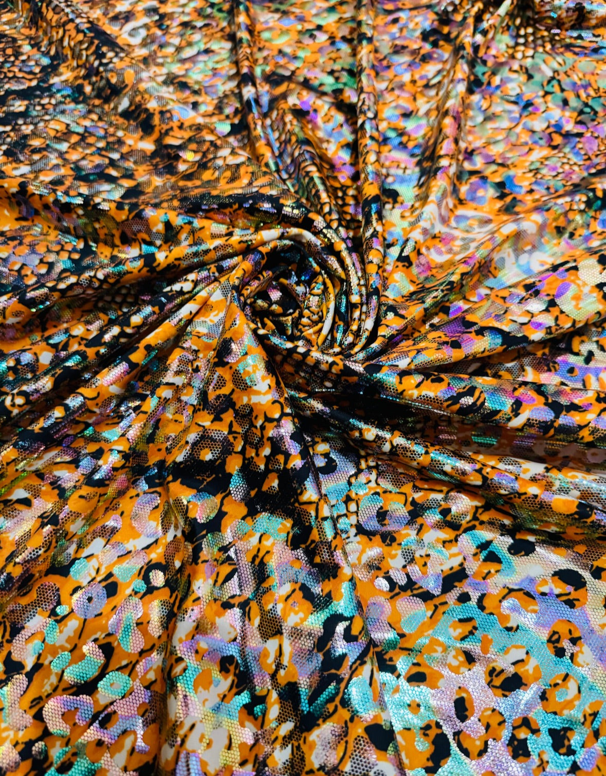 New skin reptile design prints on nylon spandex hologram metallic 4-way stretch 58/60”Sold by the YD.Ships worldwide from Los Angeles CA.