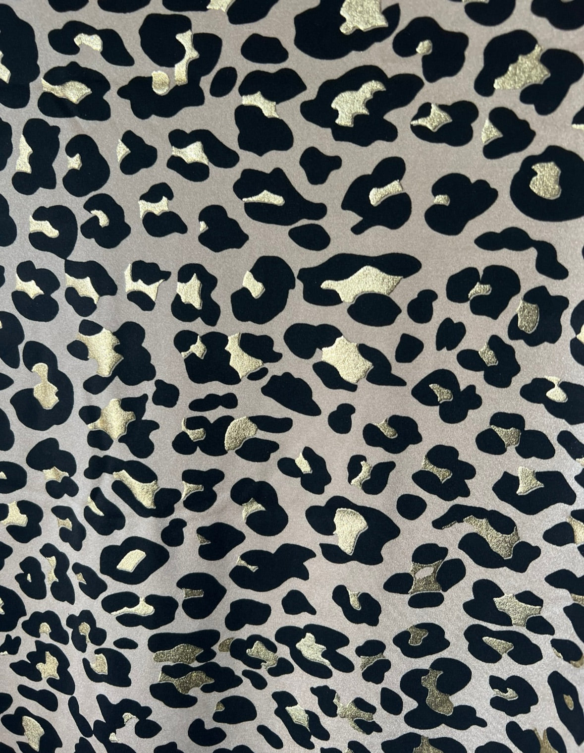 New leopard design with metallic print on the best quality nylon spandex 58/60”sold by the YD.ships worldwide from Los Angeles CA USA.