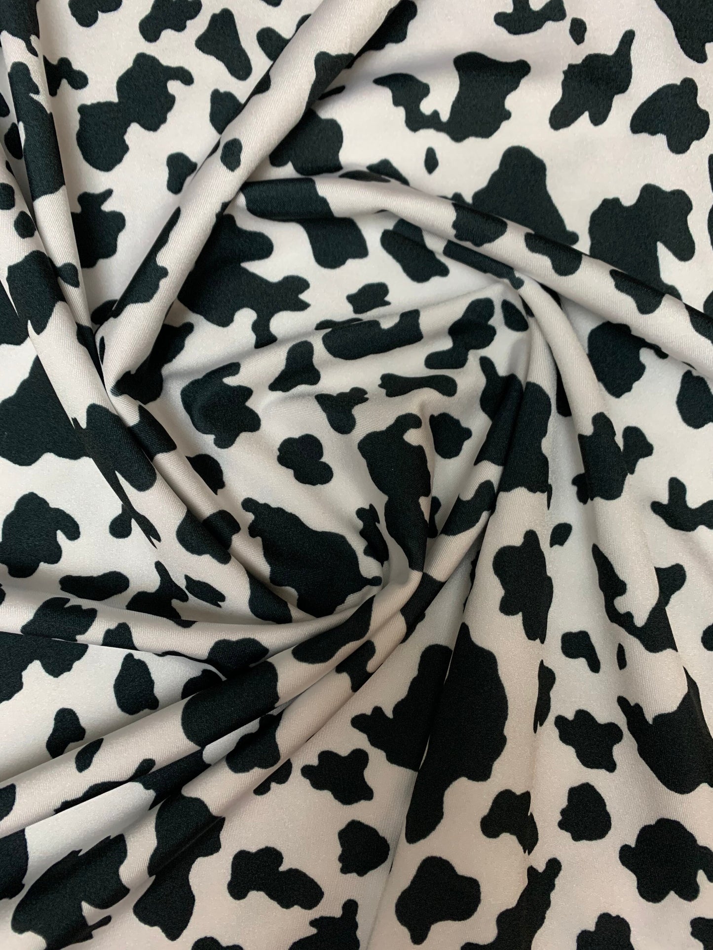 Beautiful cow design print on poly spandex 4-way stretch medium weight 58/60 sold by the YD. ships worldwide from Los Angeles California USA