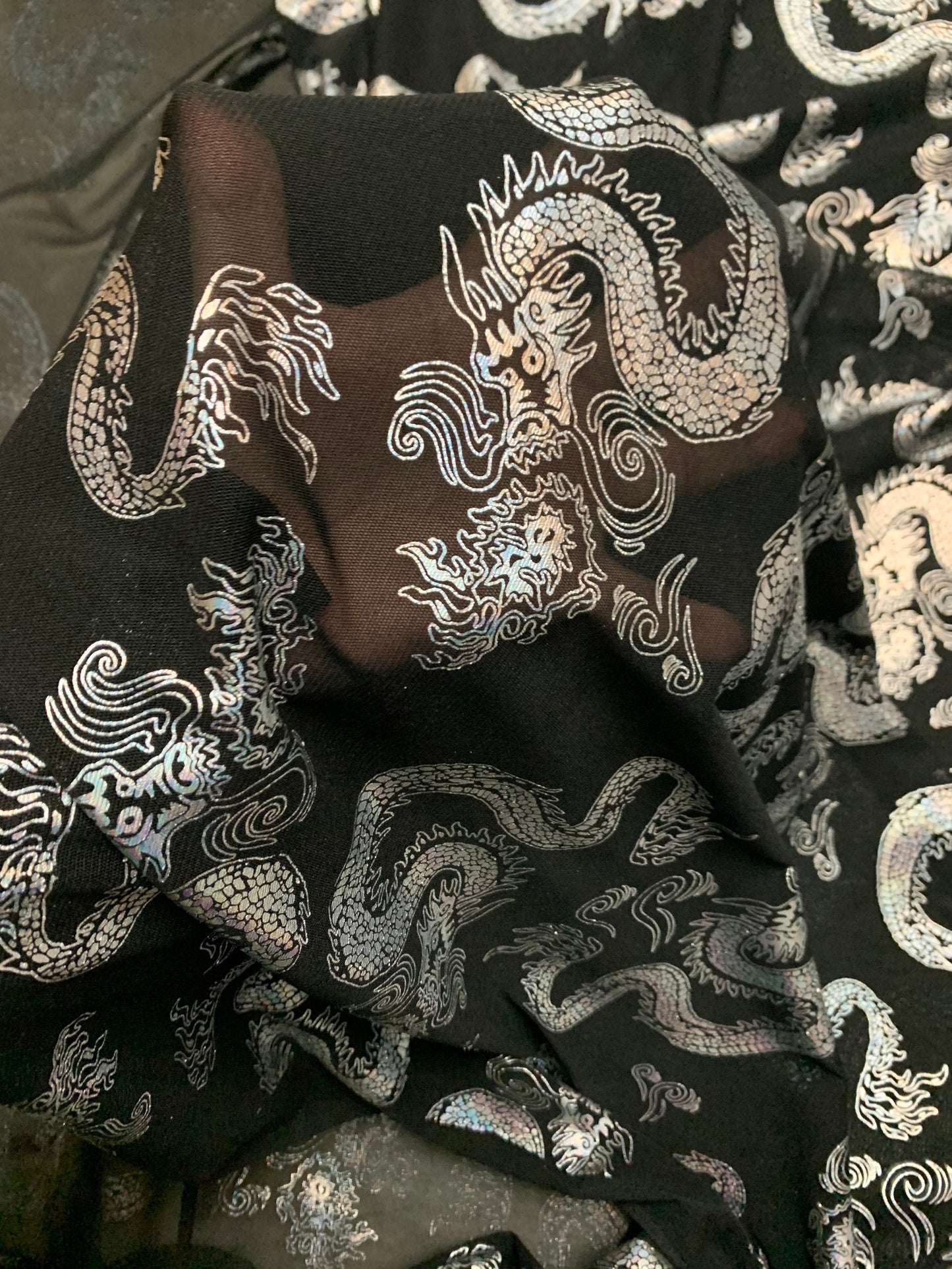 Dragon design iridescent silver power mesh nylon spandex 4-way stretch 58/60”sold by the YD.ships worldwide from Los Angeles California USA
