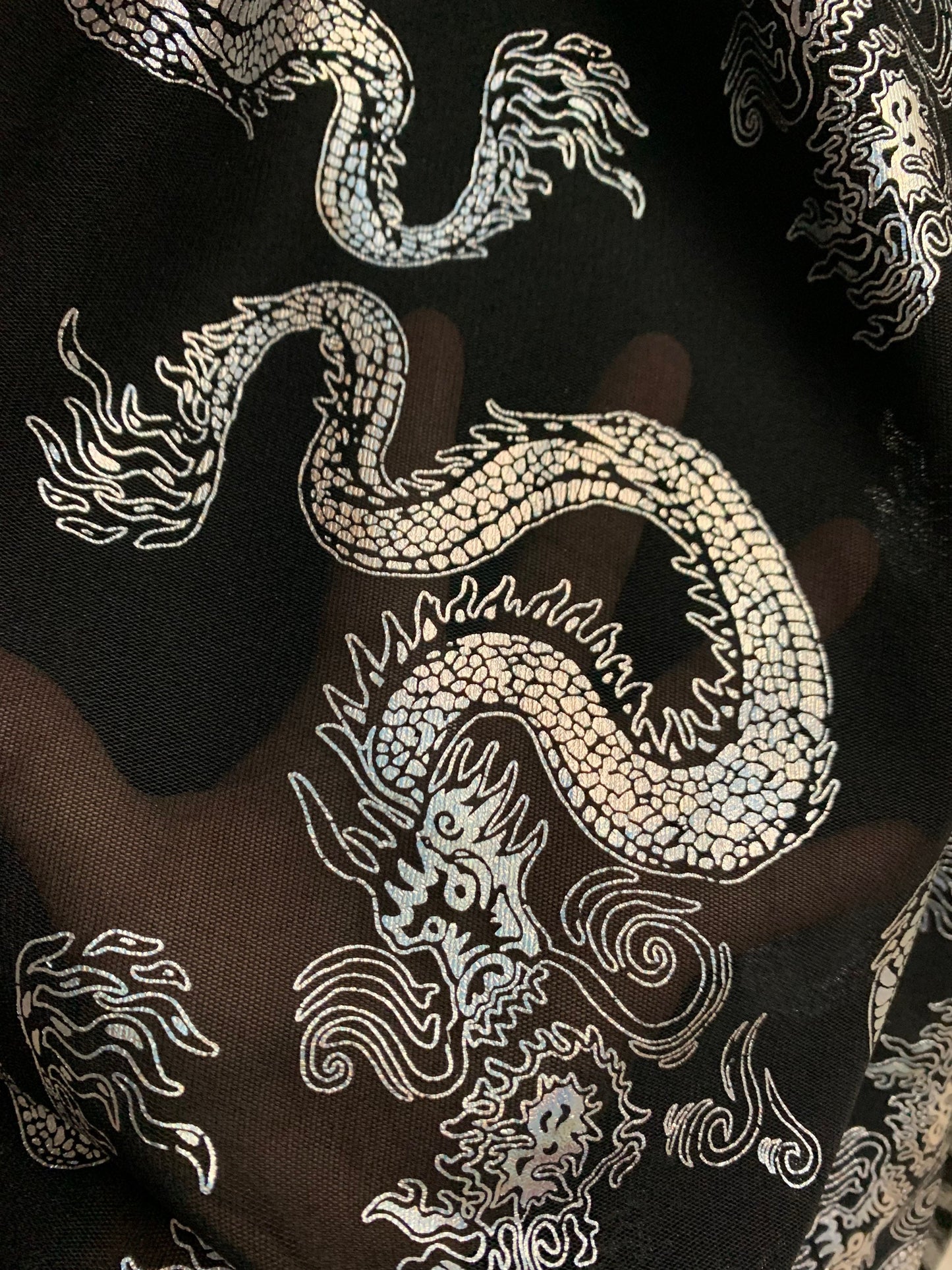 Dragon design iridescent silver power mesh nylon spandex 4-way stretch 58/60”sold by the YD.ships worldwide from Los Angeles California USA