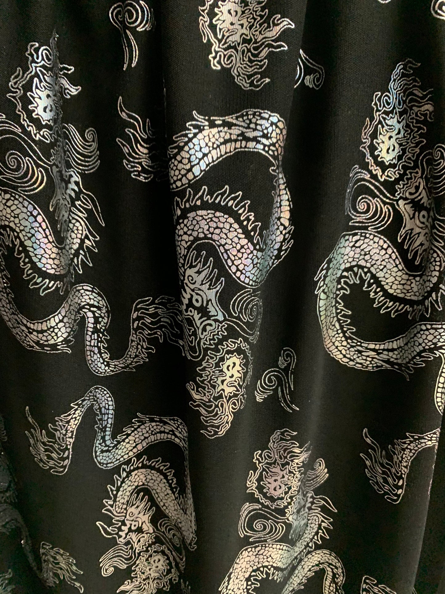 Dragon design iridescent silver power mesh nylon spandex 4-way stretch 58/60”sold by the YD.ships worldwide from Los Angeles California USA