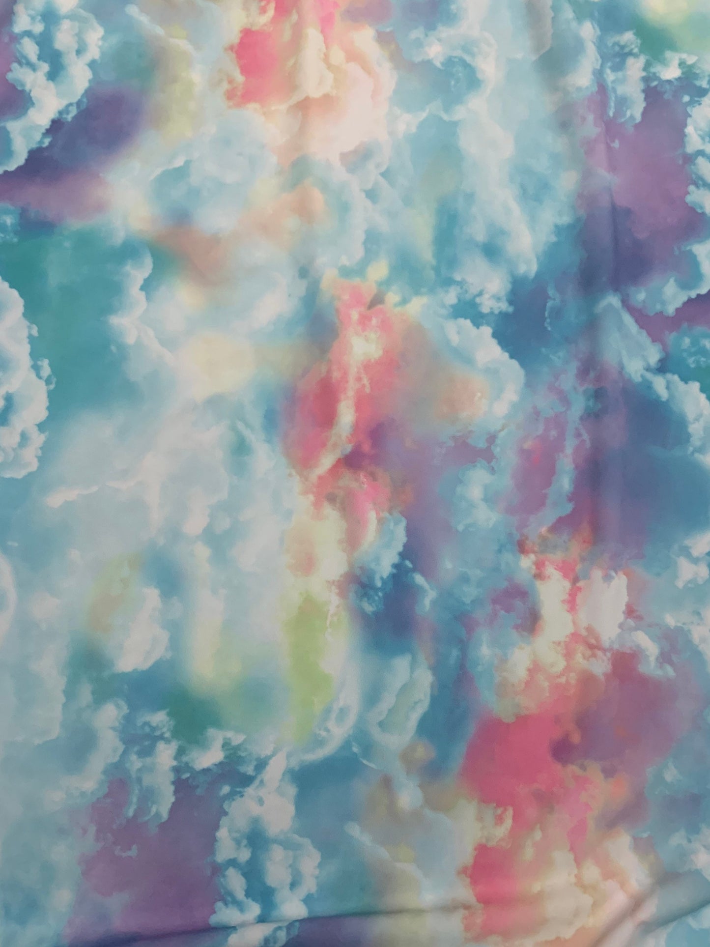Sky cloud multicolor design print on great quality nylon spandex 4-way stretch 58/60”sold by the DY. Ships Worldwide from Los Angeles CA.