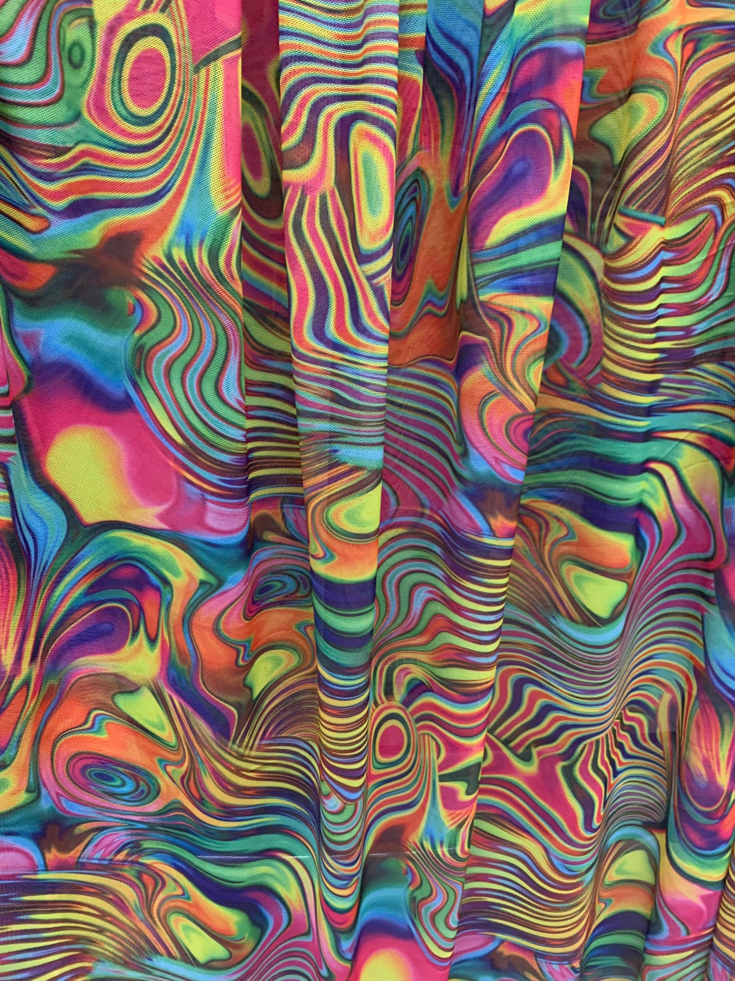 Molten lava art power mesh design 4-way stretch 58/69”sold by the YD. ships worldwide from Los Angeles California USA