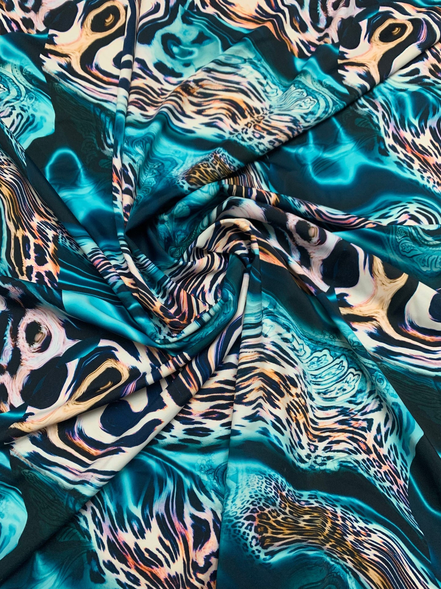 Abstract animal print on the best quality nylon spandex4-way stretch 58/60”sold by the YD. ships Worldwide from Los Angeles California USA