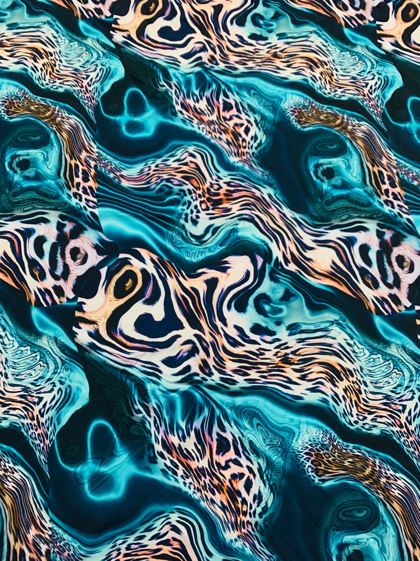 Abstract animal print on the best quality nylon spandex4-way stretch 58/60”sold by the YD. ships Worldwide from Los Angeles California USA