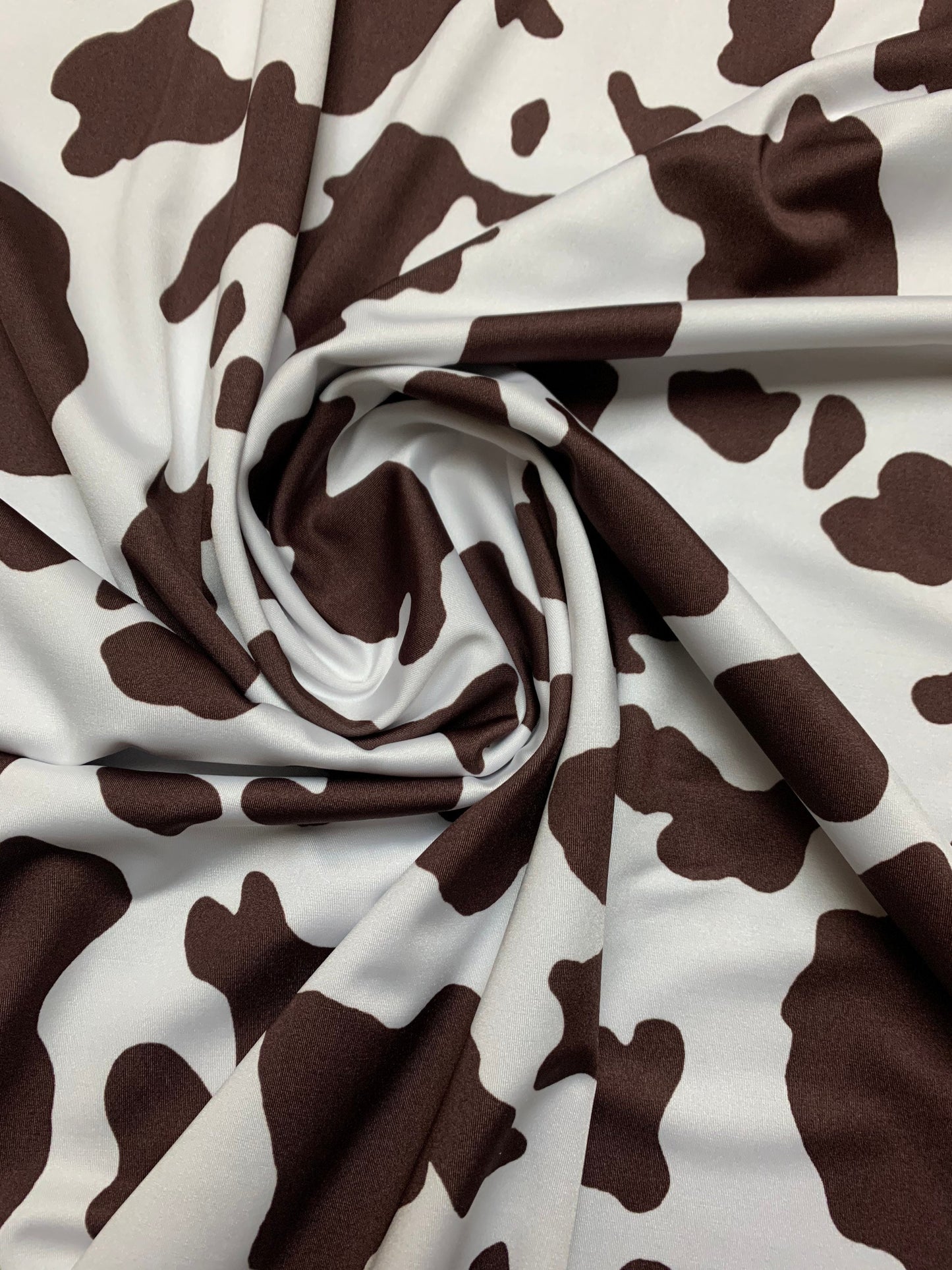 Beautiful cow design print on best quality of nylon spandex 4-way stretch 58/60”sold by the YD. ships Worldwide from Los Angeles CA USA.