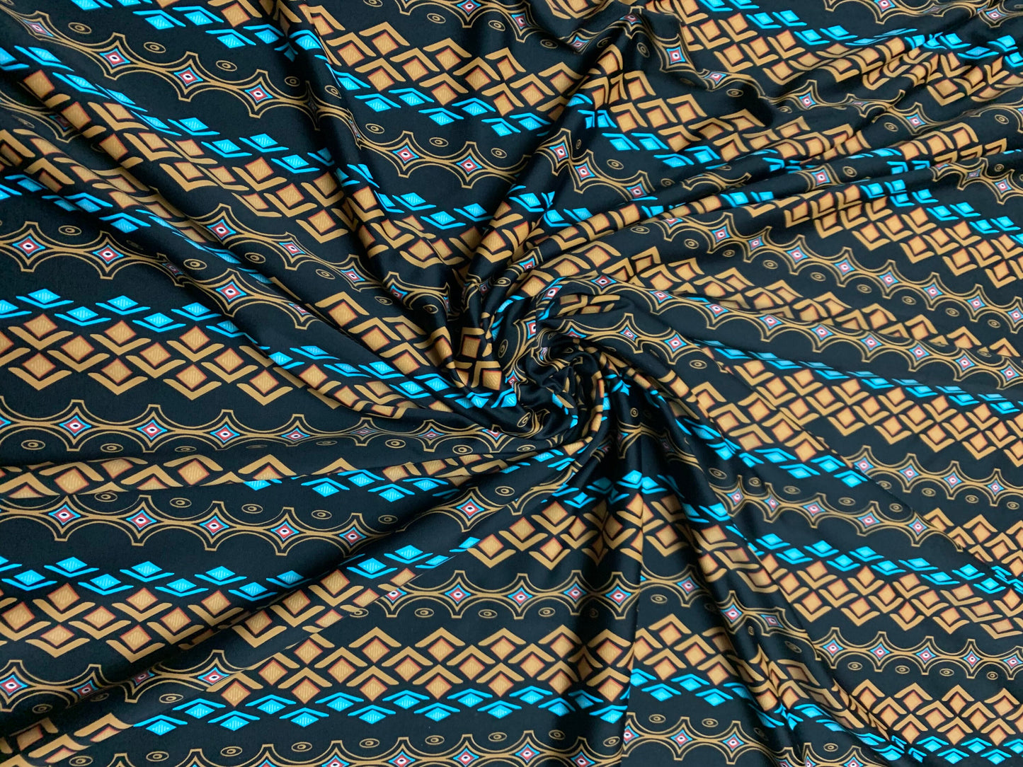 African pattern design print on nylon spandex 4-way stretch 58/60”sold by the YD. ships worldwide from Los Angeles California USA.