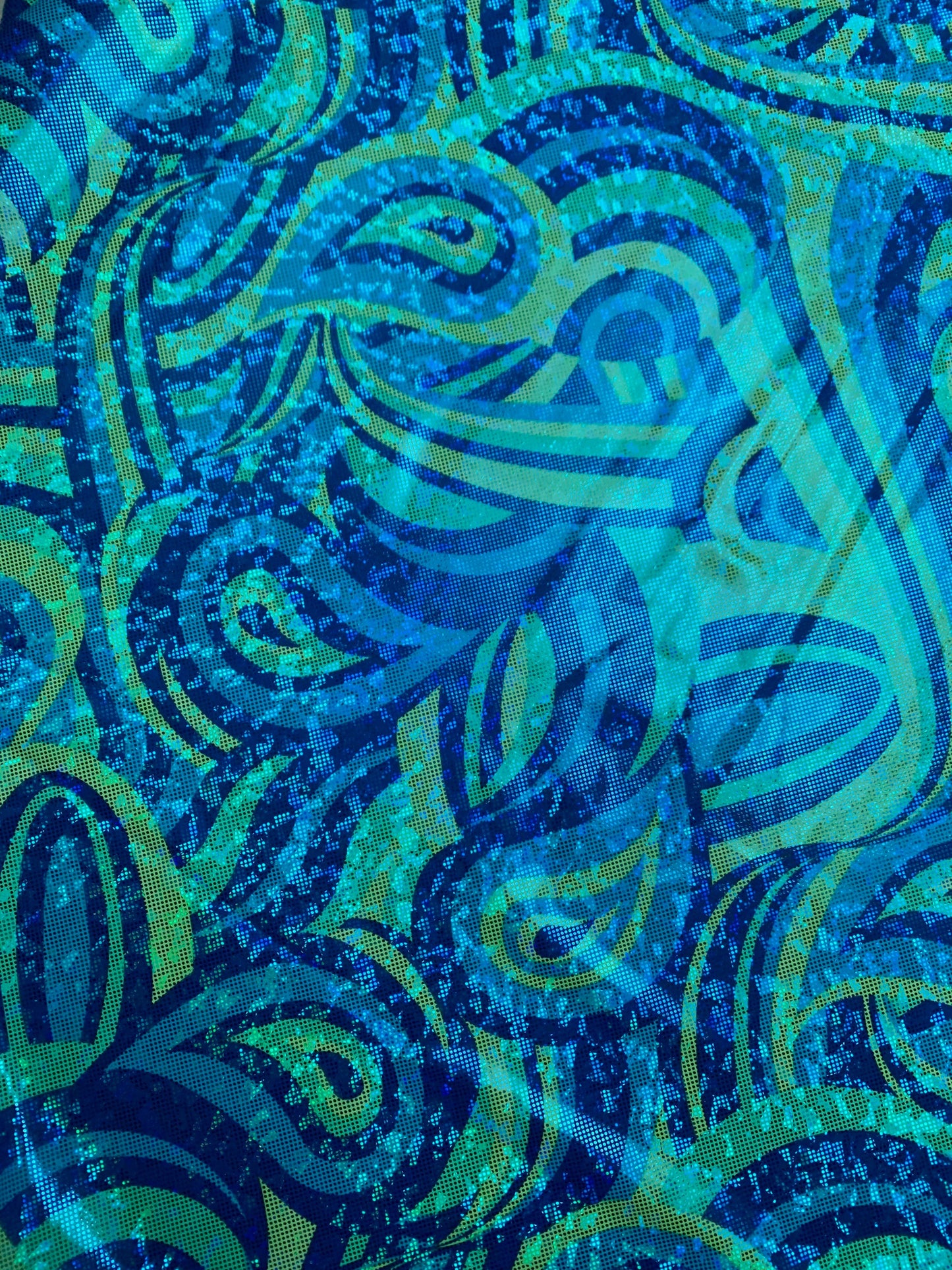 Abstract pattern design hologram metallic Print on nylon spandex 4-way stretch 58/60”sold by the YD. ships Worldwide from Los Ángeles CA