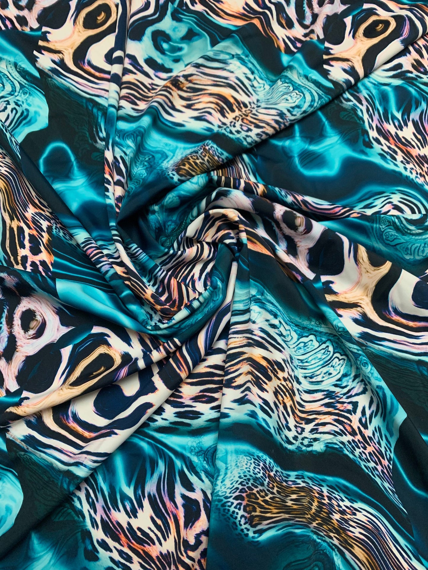 Abstract animal print on the best quality nylon spandex4-way stretch 58/60”sold by the YD. ships Worldwide from Los Angeles California USA