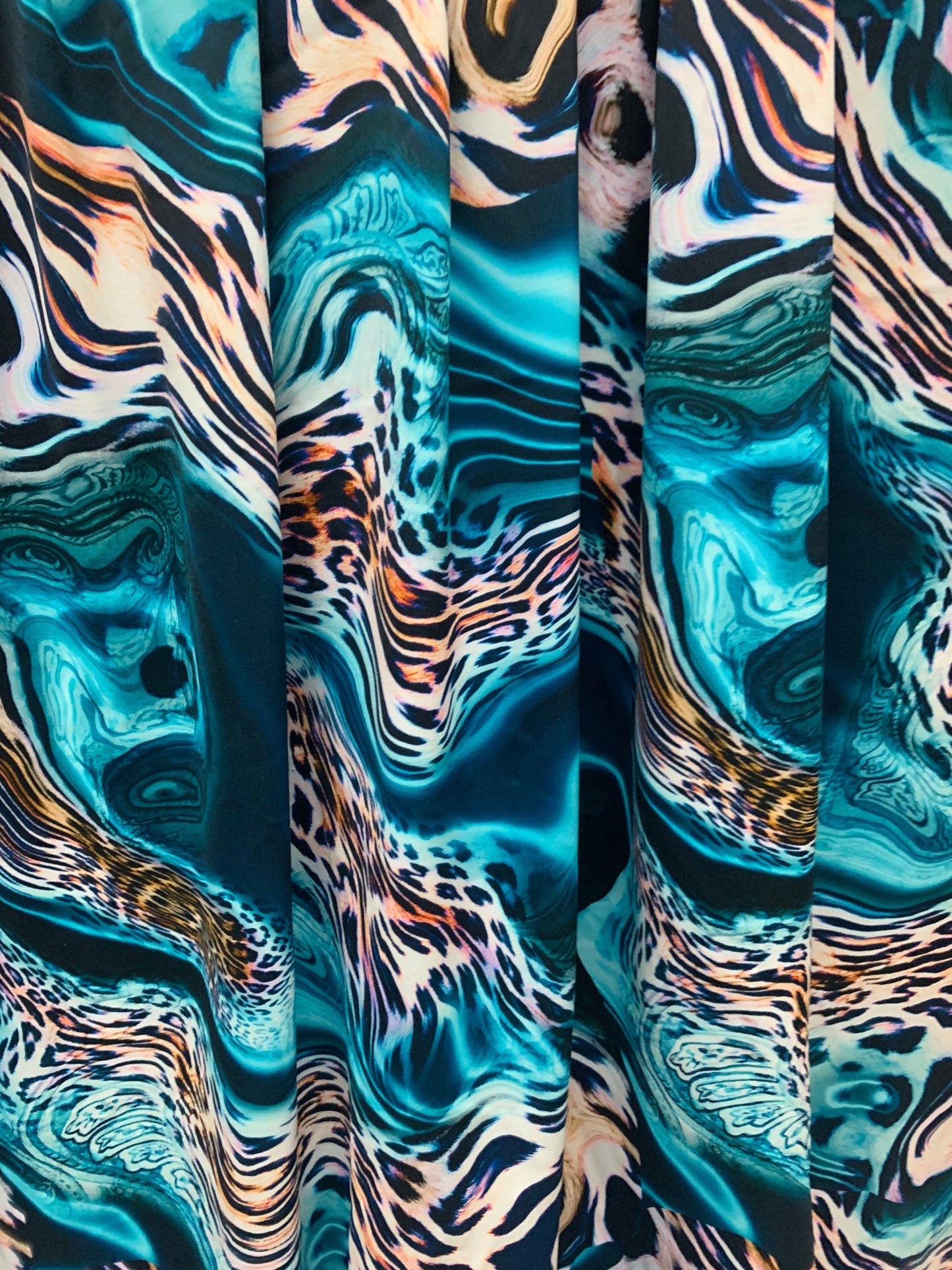 Abstract animal print on the best quality nylon spandex4-way stretch 58/60”sold by the YD. ships Worldwide from Los Angeles California USA