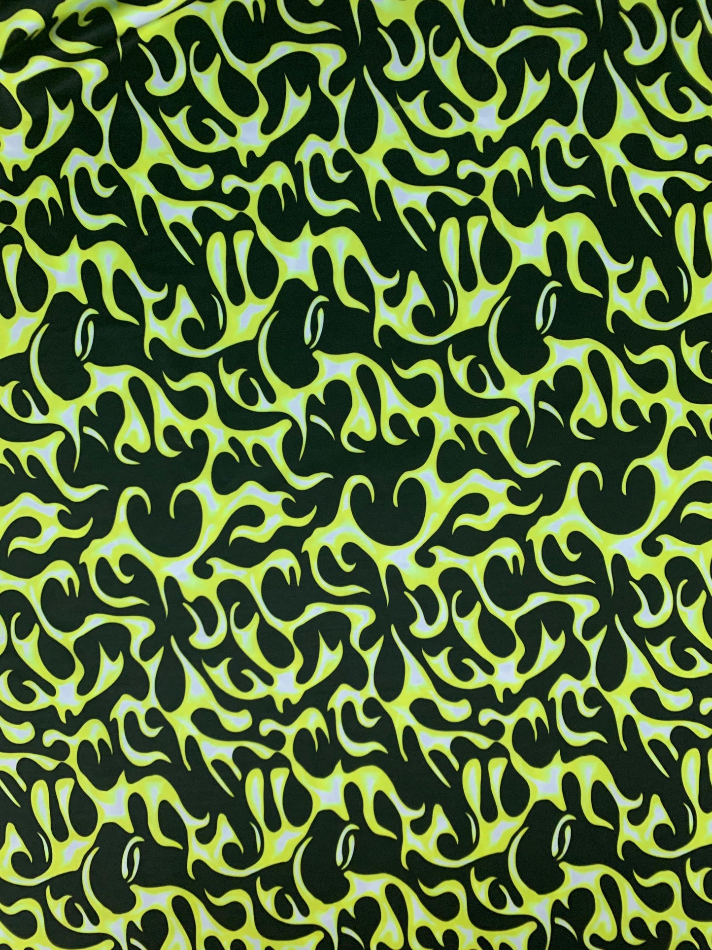 Fire flames design Neon colors print on the best quality of nylon spandex 4-way stretch 59/60”sold by the YD. ships worldwide from L.A CA