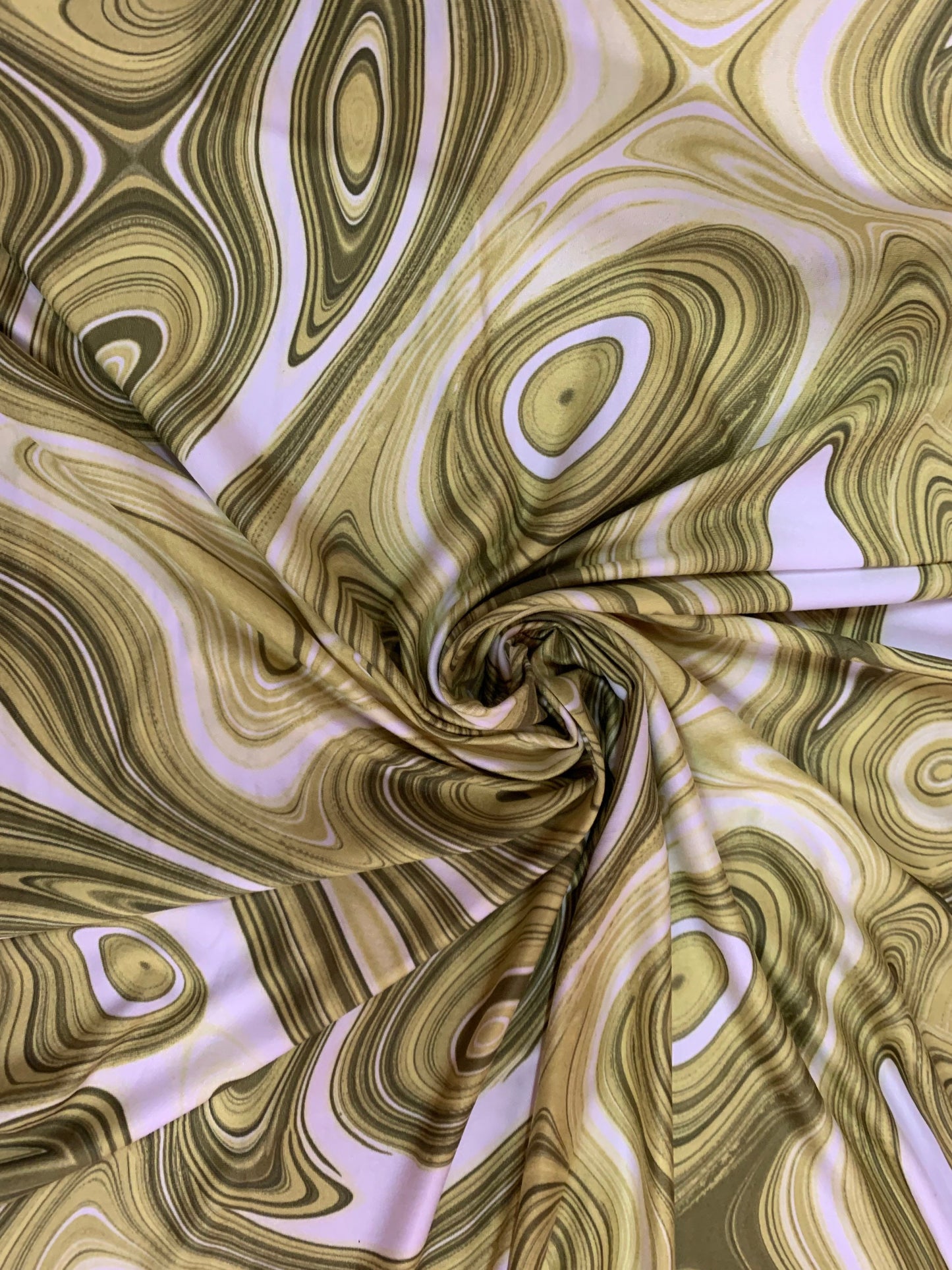 Lava abstract design print on the best quality of nylon spandex 4-way stretch 58/60”sold by the YD.ships Worldwide from Los Angeles CA USA.