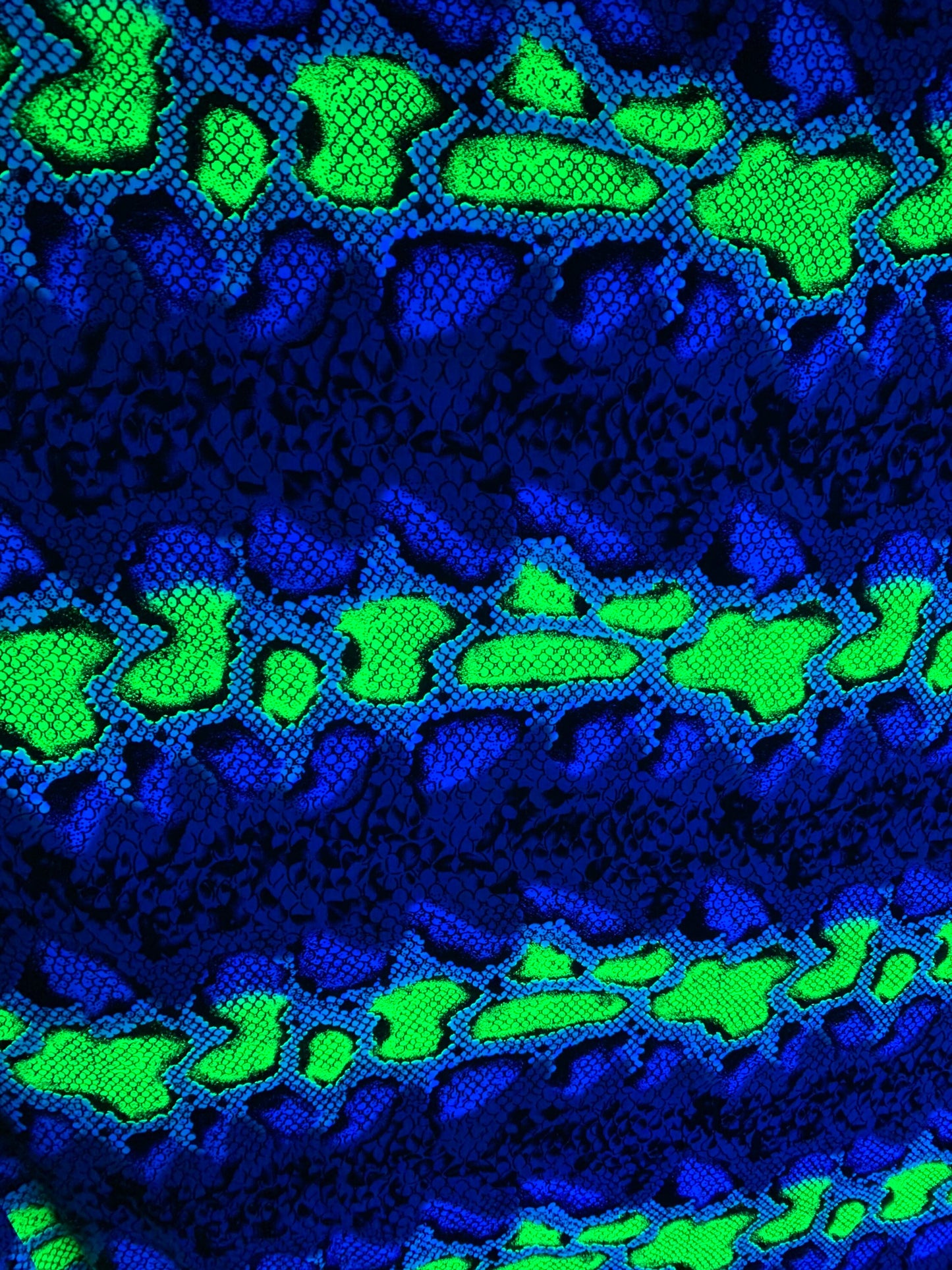 New skin snake design poly power mesh 4-stretch it glows in the dark with black light 58/60” Sold by the YD. Ships Worldwide LA.CA