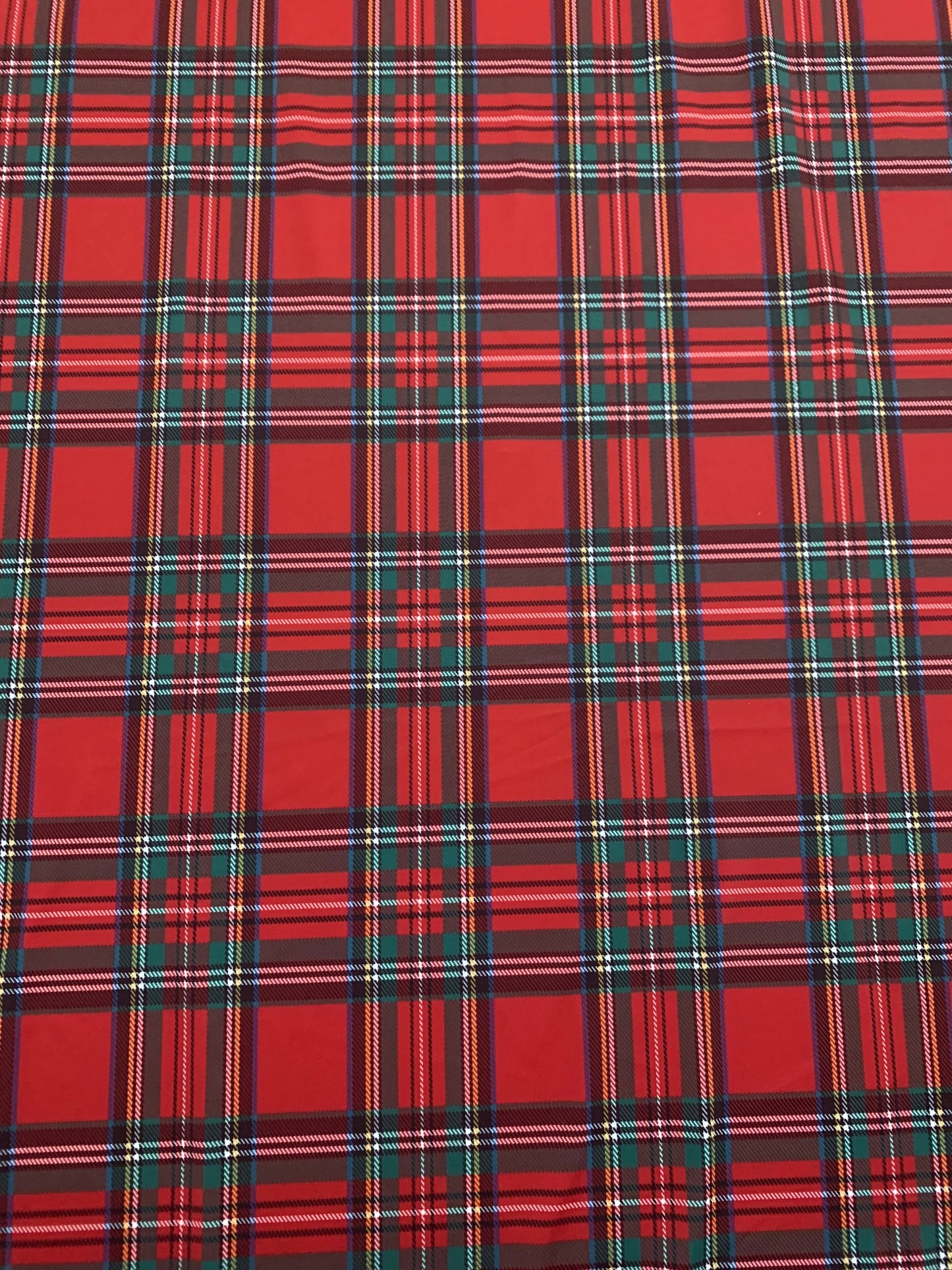 Red & green tartan plaid design print on nylon spandex 4-way stretch 58/60”sold by the YD. ships worldwide from Los Angeles California USA.