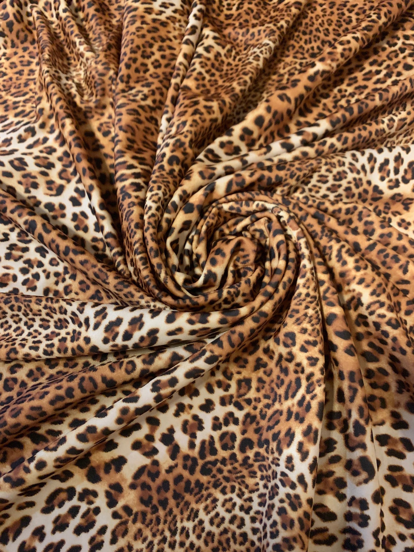 New Leopard design print on the best quality of nylon spandex 4way-stretch 58/60”sold by the YD. Ships Worldwide from Los Angeles C.A USA.