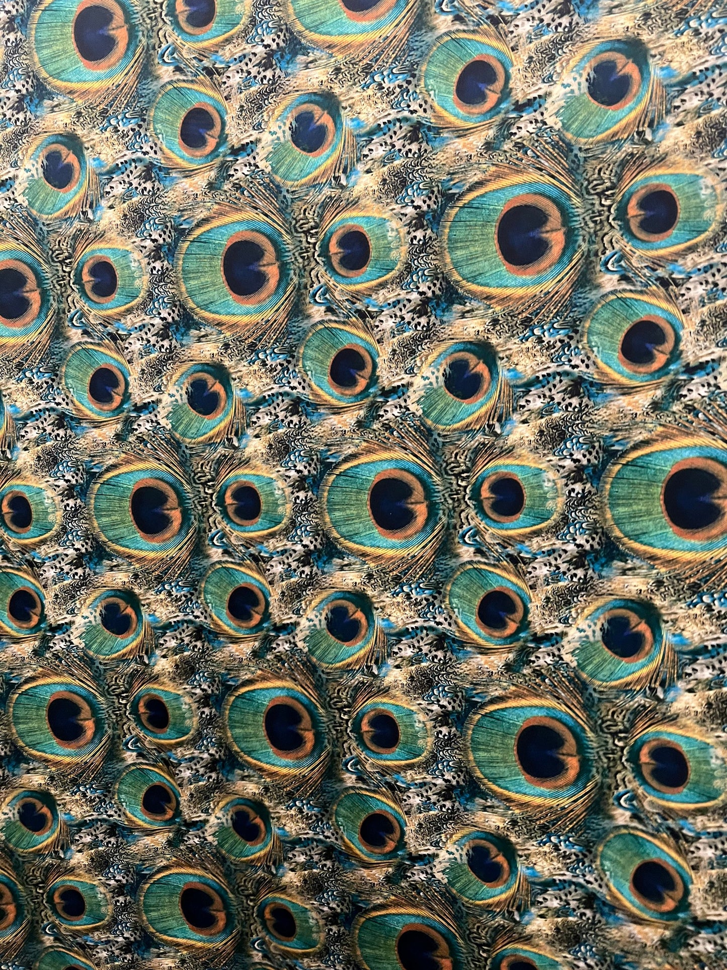 New peacock pattern design print on the best quality of nylon spandex 4-way stretch 58/60” sold by the YD.ships worldwide from Los Angeles.