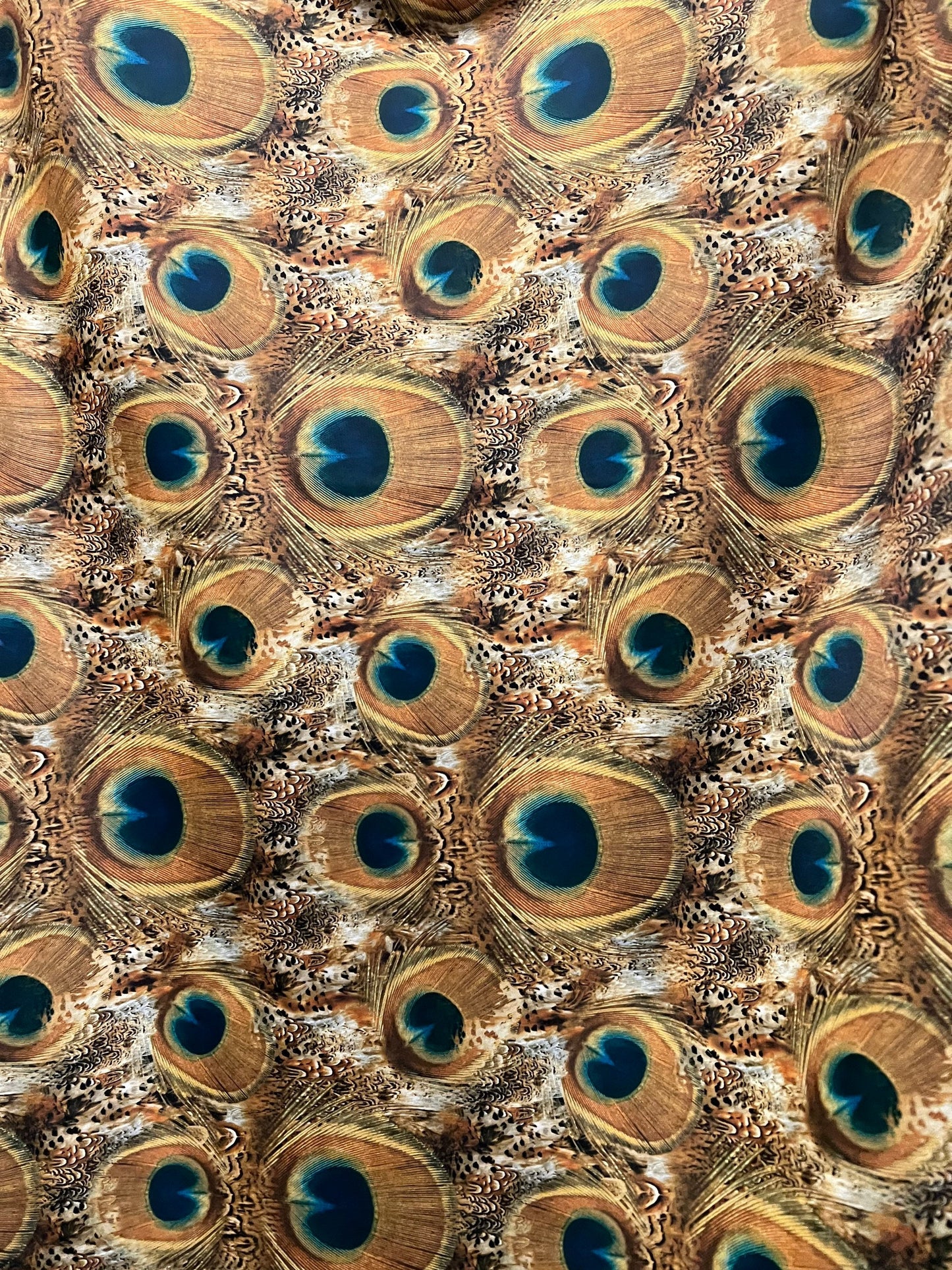 New peacock pattern design print on the best quality of nylon spandex 4-way stretch 58/60” sold by the YD.ships worldwide from Los Angeles.