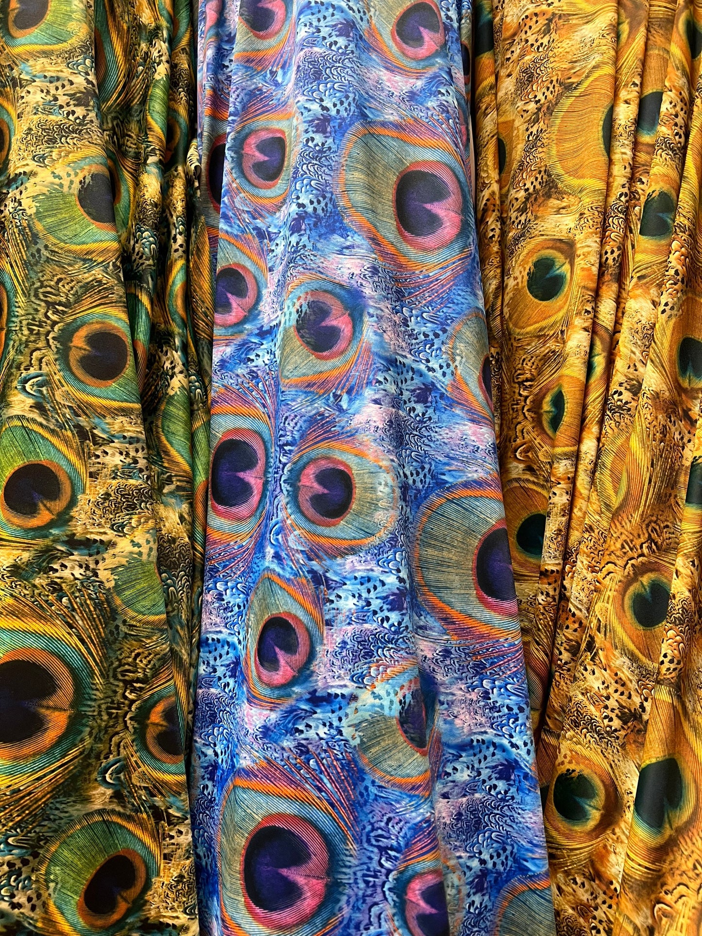New peacock pattern design print on the best quality of nylon spandex 4-way stretch 58/60” sold by the YD.ships worldwide from Los Angeles.