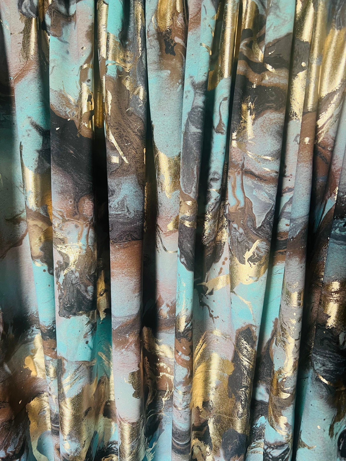 Abstract art design with metallic print on the best quality of nylon spandex-4 58/60”sold by the YD.ships worldwide from Los Angeles CA USE