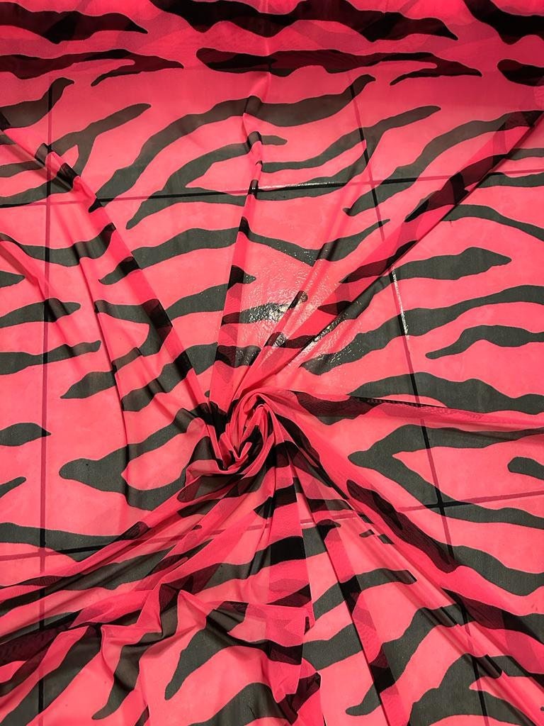 New tiger pattern design print on great quality of power mesh 58/60”sold by the YD.Ships worldwide from Los Angeles California USA.