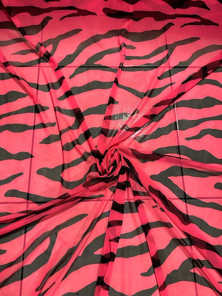 New tiger pattern design print on great quality of power mesh 58/60”sold by the YD.Ships worldwide from Los Angeles California USA.