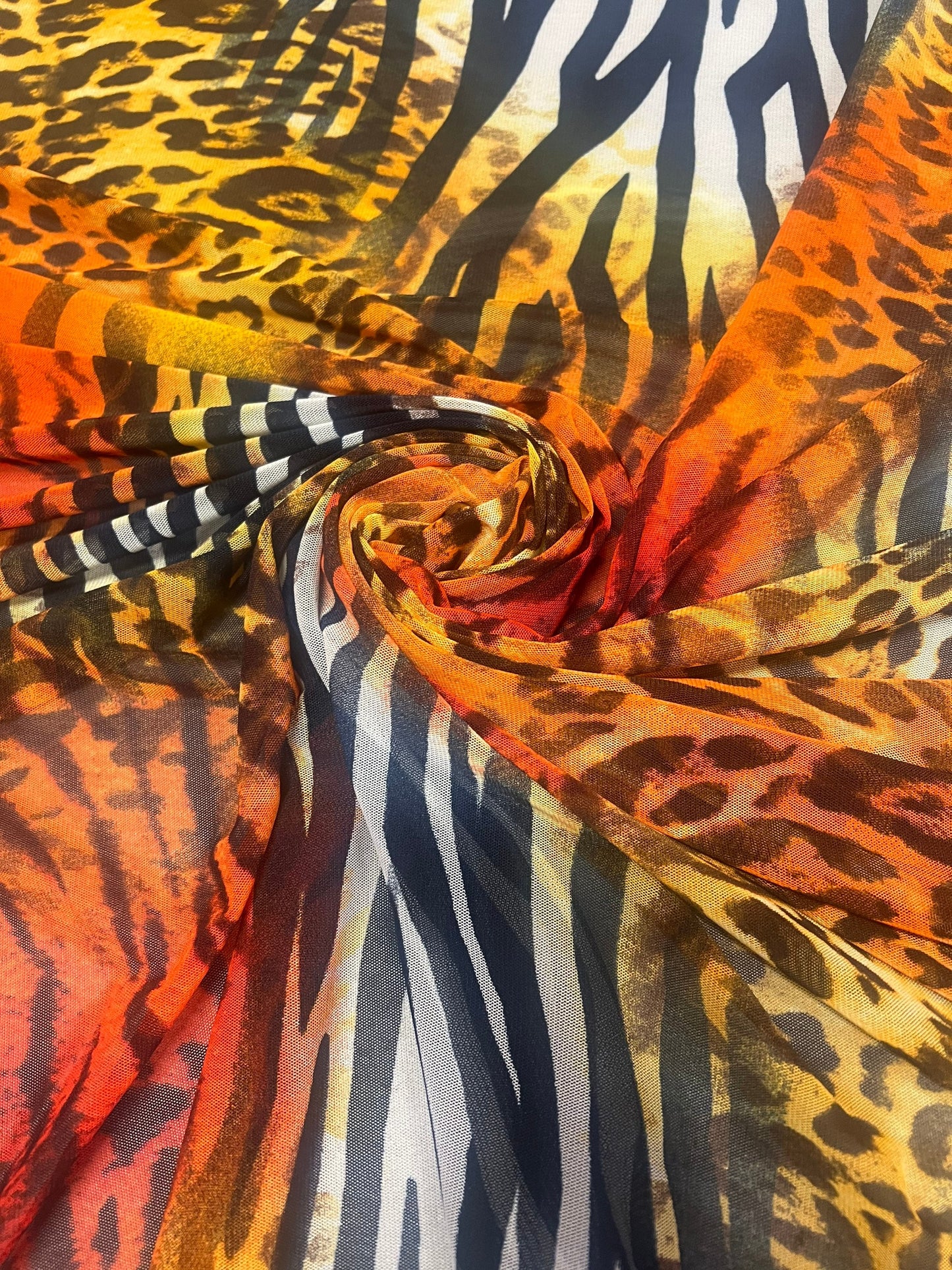 New exotic animal design print on power mesh nylon spandex 4-stretch 58/60”Sold by the YD.Ships worldwide from Los Angeles California USA.