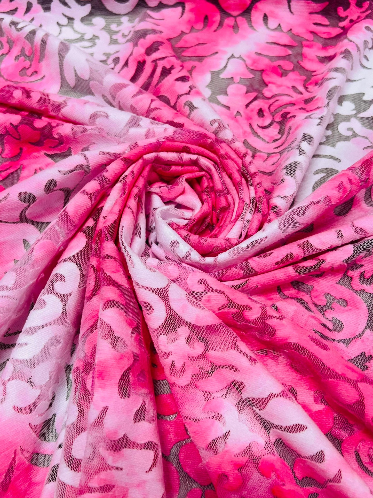 Damask tie dye design burnout mesh 2-way stretch 58/60”Sold by the YD. Ships worldwide from Los Angeles California USA