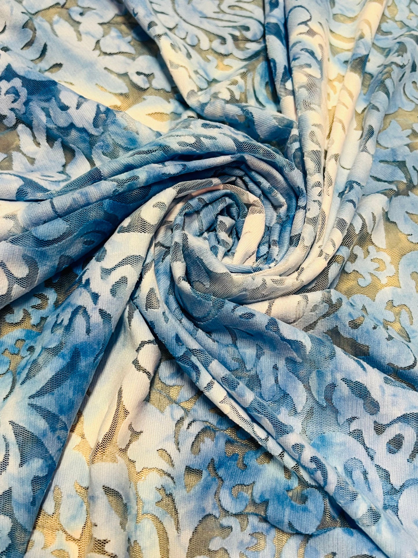 Damask tie dye design burnout mesh 2-way stretch 58/60”Sold by the YD. Ships worldwide from Los Angeles California USA