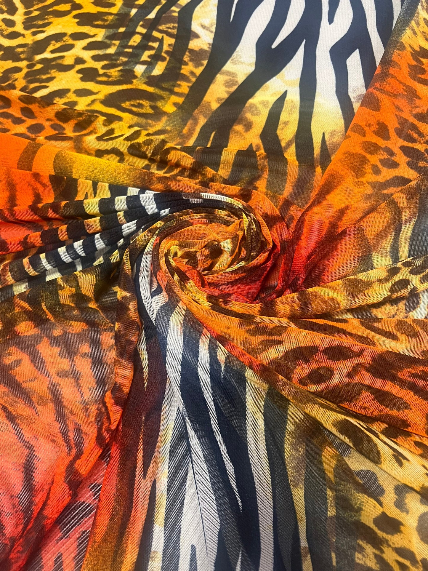 New exotic animal design print on power mesh nylon spandex 4-stretch 58/60”Sold by the YD.Ships worldwide from Los Angeles California USA.