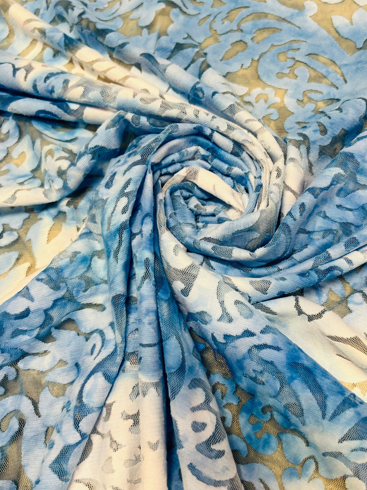 Damask tie dye design burnout mesh 2-way stretch 58/60”Sold by the YD. Ships worldwide from Los Angeles California USA