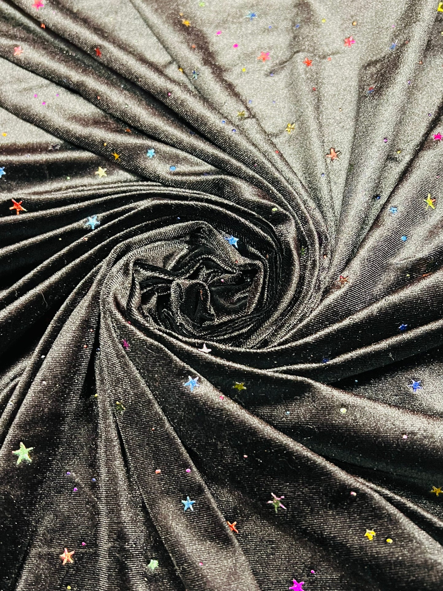 Stretch velvet with small stars design metallic 4-way stretch 58/60”sold by the YD. Ships worldwide from Los Angeles California USA