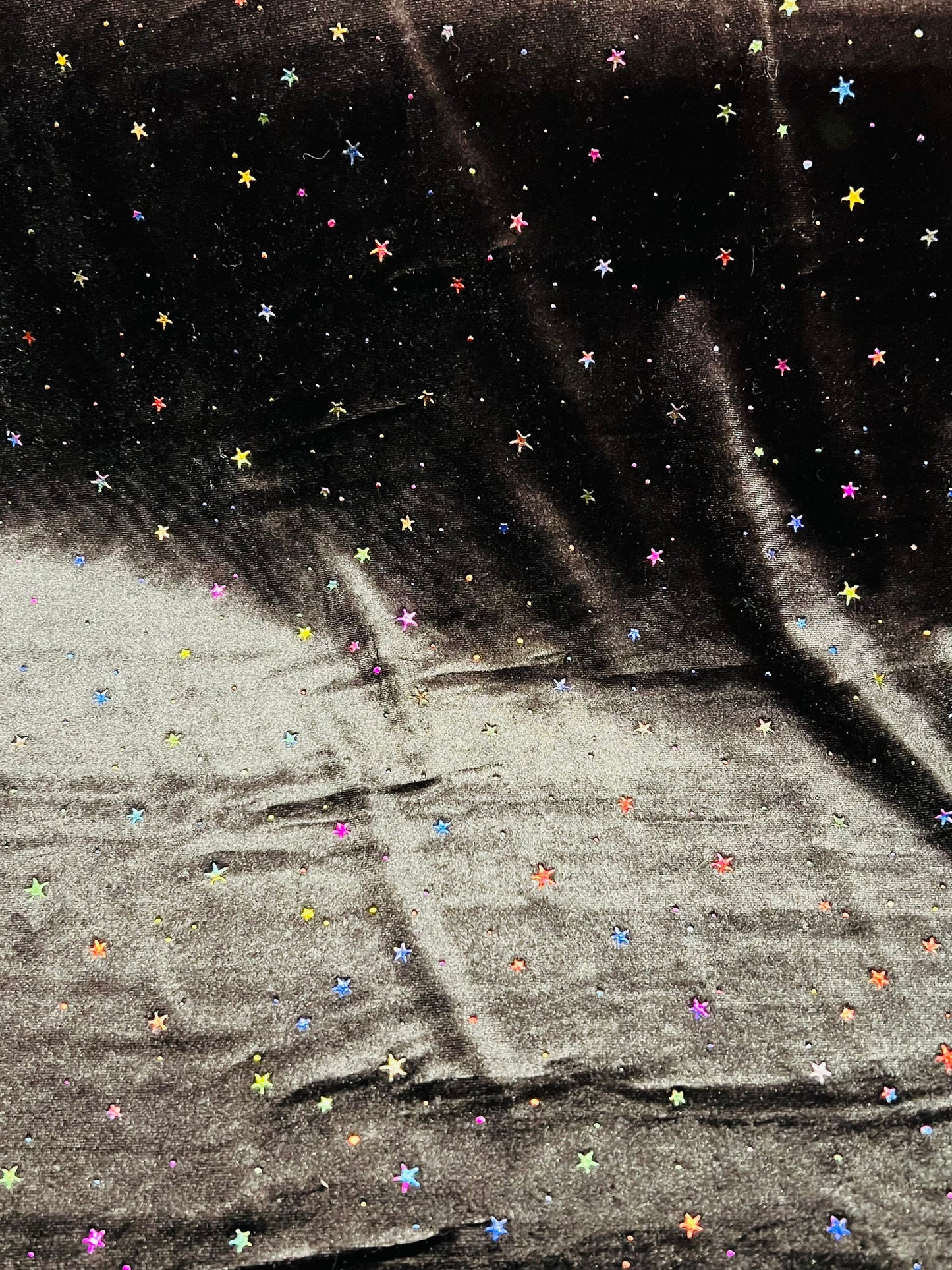 Stretch velvet with small stars design metallic 4-way stretch 58/60”sold by the YD. Ships worldwide from Los Angeles California USA