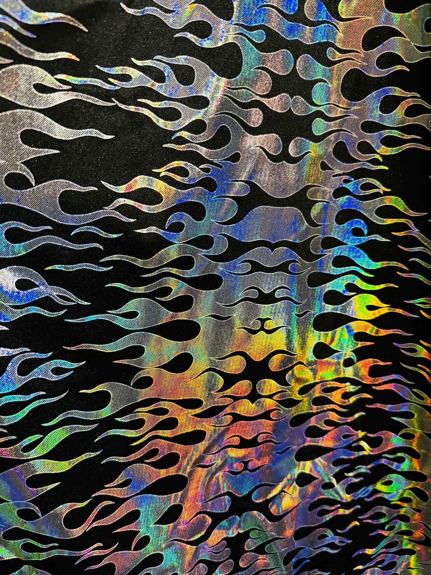 New flames pattern design hologram metallic nylon spandex 4-way stretch 58/60”Sold by the YD. Ships from Los Angeles California USA.