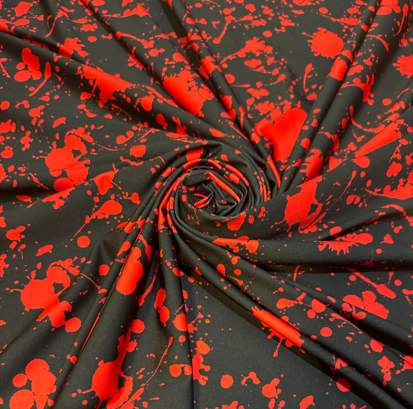 New Colorful red splatter paint design print on the best quality of nylon spandex 4way stretch 58/60” Sold by the YD.Ships worldwide from LA
