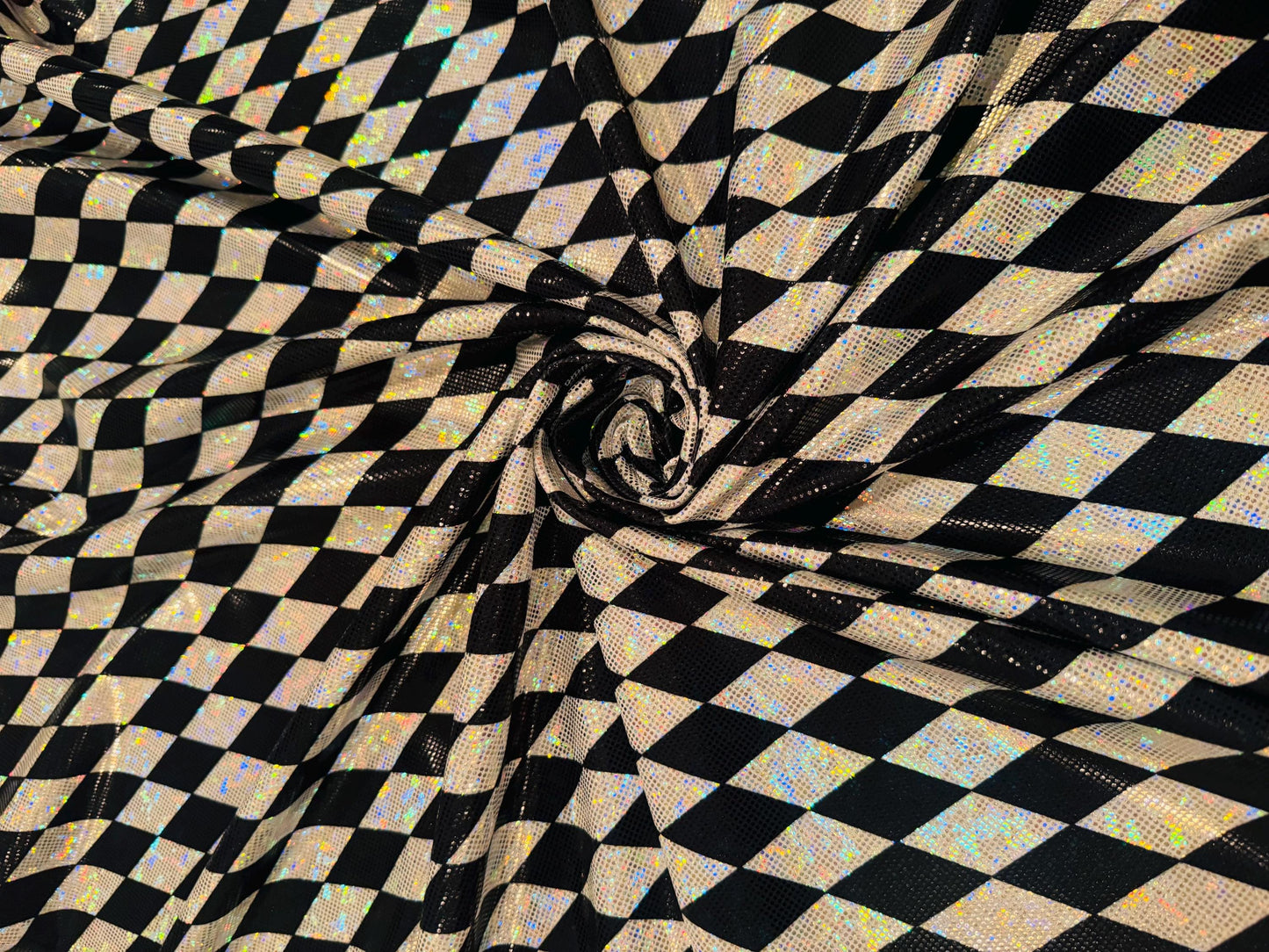 New Harlequin Diamonds design print on shattered glass holograma metallic nylon spandex 4way stretch 58/60”Sold by the YD.