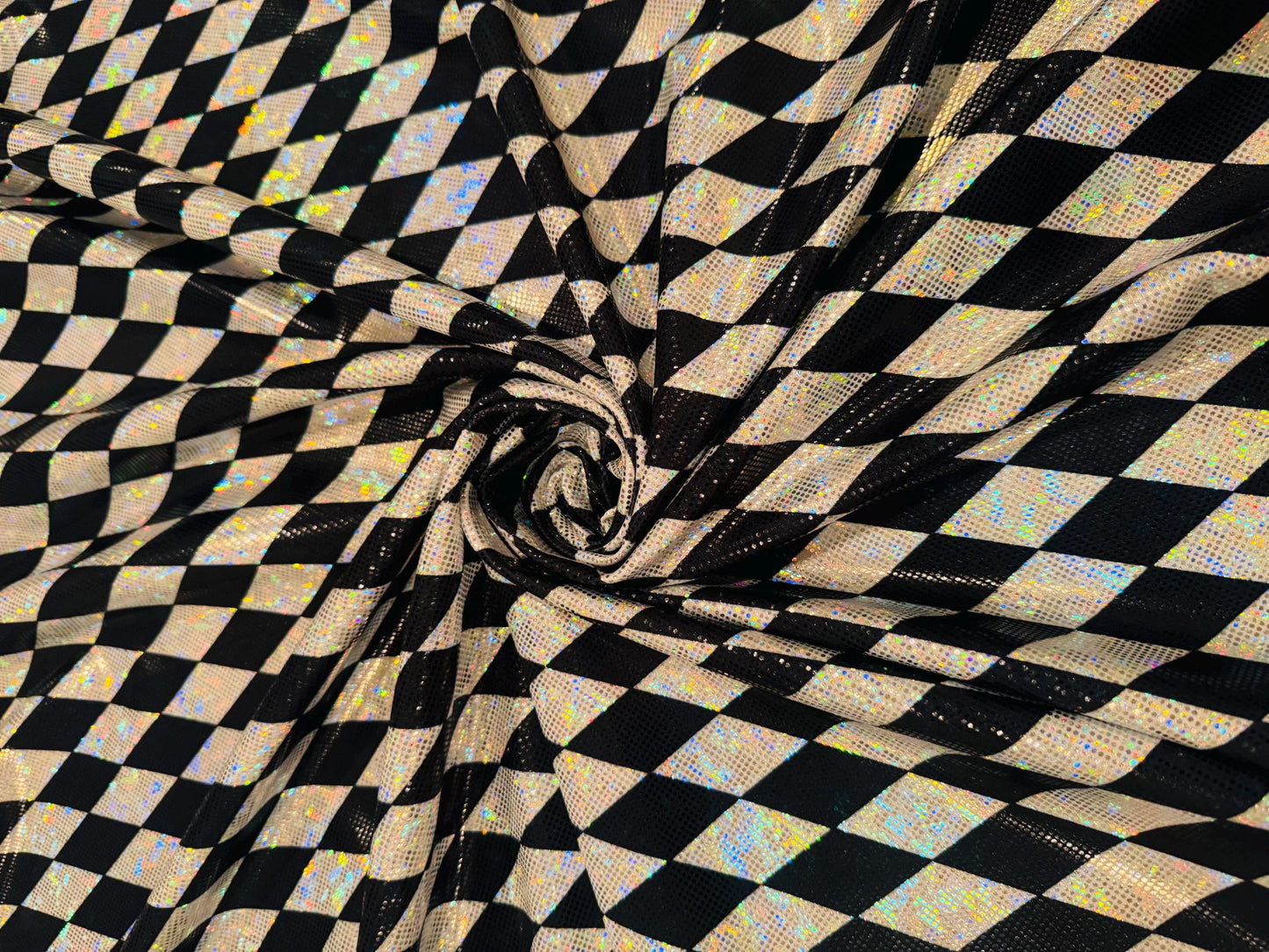 New Harlequin Diamonds design print on shattered glass holograma metallic nylon spandex 4way stretch 58/60”Sold by the YD.