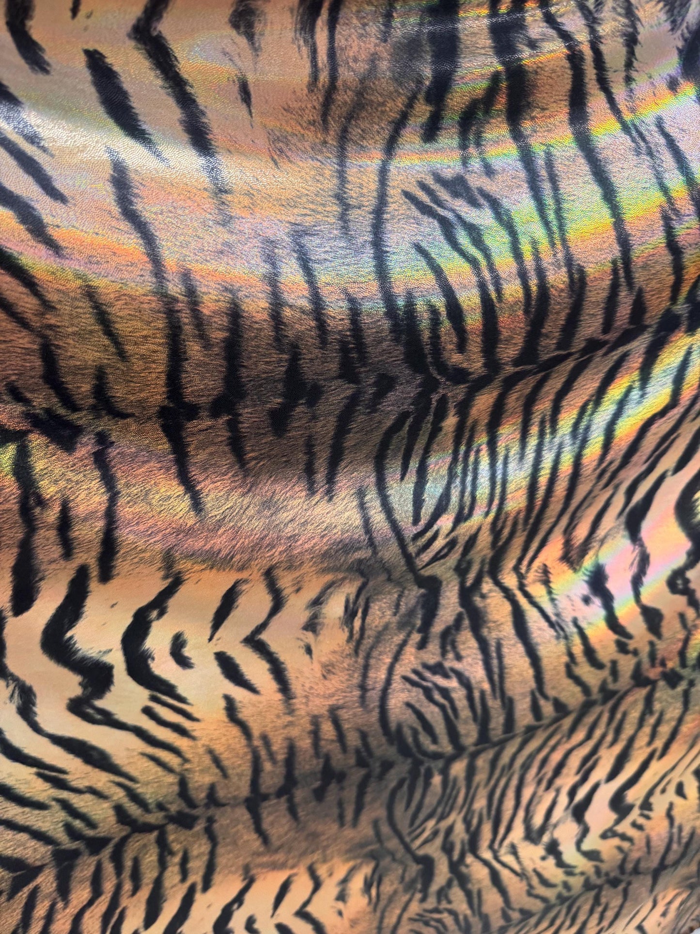 New Iridescent Luxury Exotic tiger design print on holograma metallic nylon spandex 4way stretch 58/60”Sold by the YD.