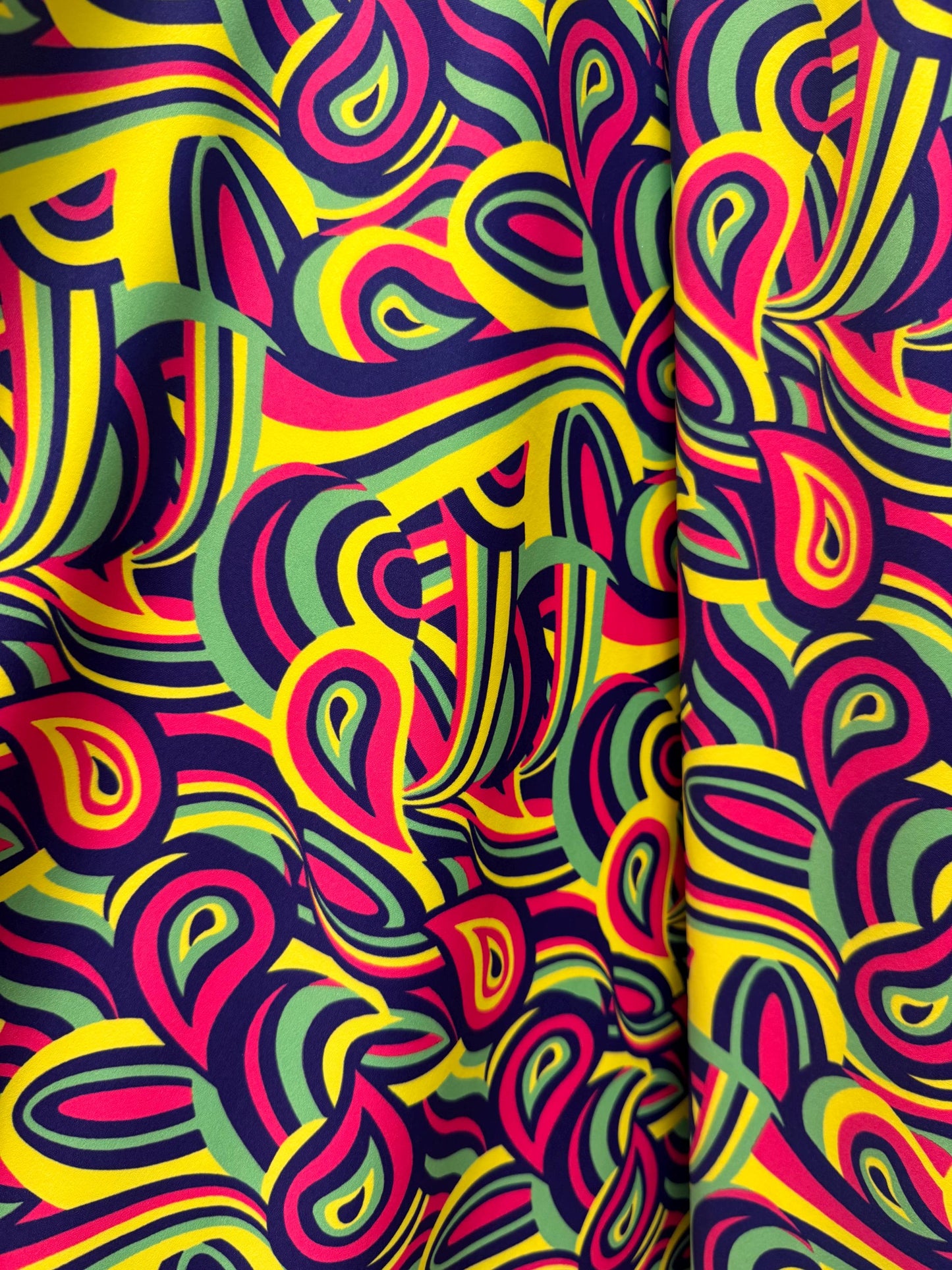 New colorful paisley design print on the best quality of nylon spandex 4-way stretch 58/60”Sold by the YD.Ships worldwide from Los Angeles