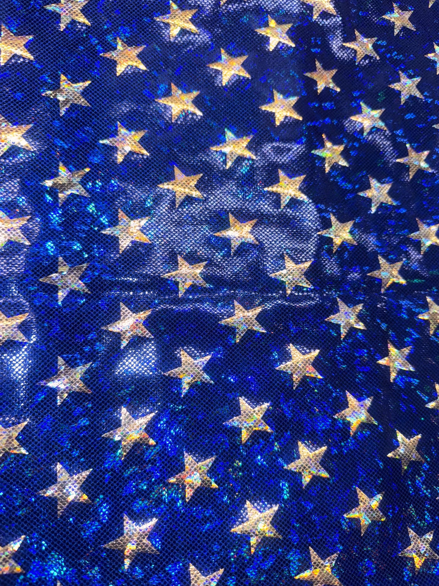 New Starlight pattern design on shattered glass holograma metallic nylon spandex 4way stretch 58/60”Sold by the YD.from Los Angeles CA USA.