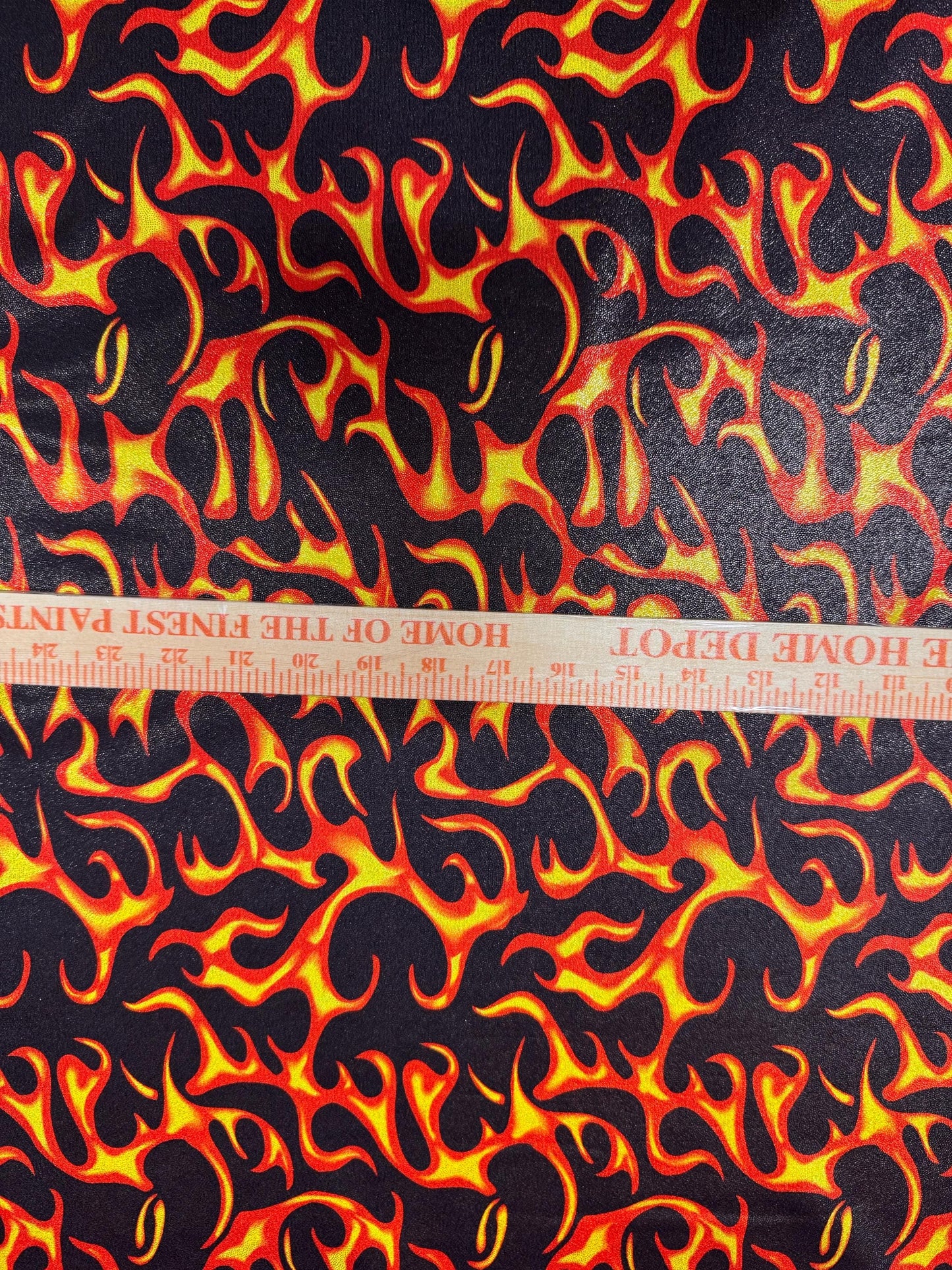 New Ghost Rider flames design print on metallic hologram nylon spandex 58/60”Sold by the YD.Ships worldwide from Los Angeles California