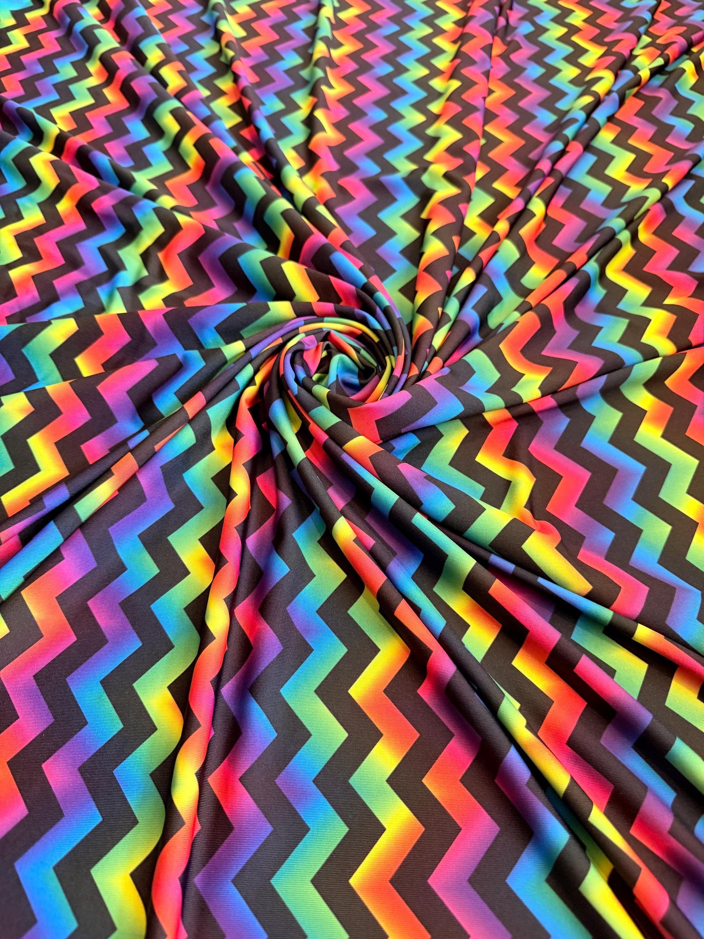 New tie dye zigzag design print on the best quality nylon spandex4-way stretch 58/60”sold by the YD. ships Worldwide from Los Angeles