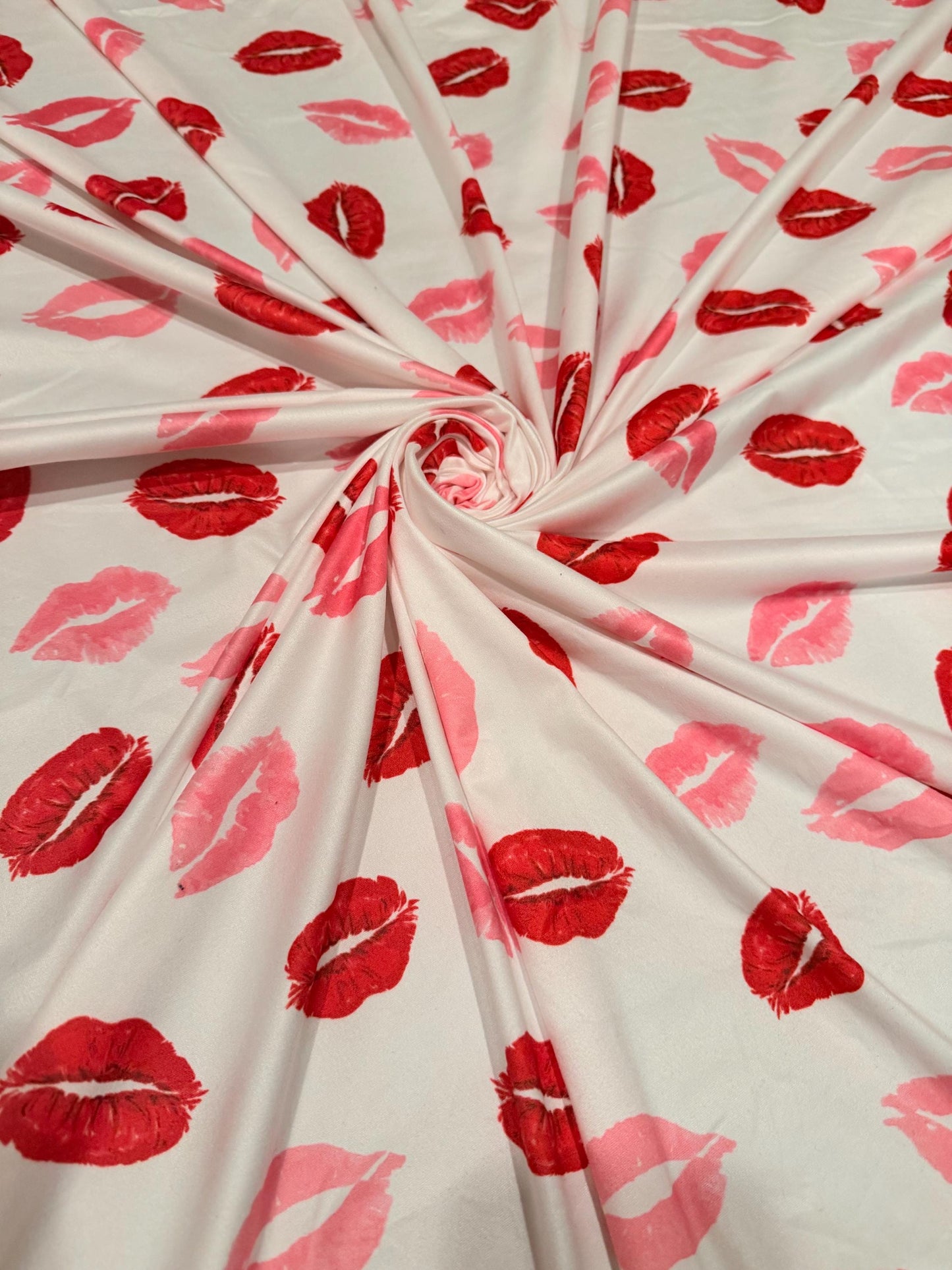 Bella red lipstick design print on poly spandex 4-way stretch medium weight 58/60 sold by the YD. ships worldwide from Los Angeles CA