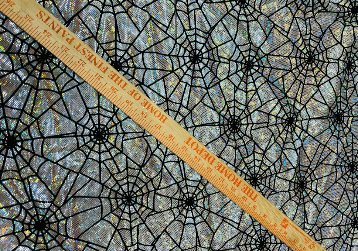 New Spiderwebs design print on hologram metallic nylon spandex with flocking 4-way stretch 58/60”sold by the YD.Ships worldwide from LA USA.