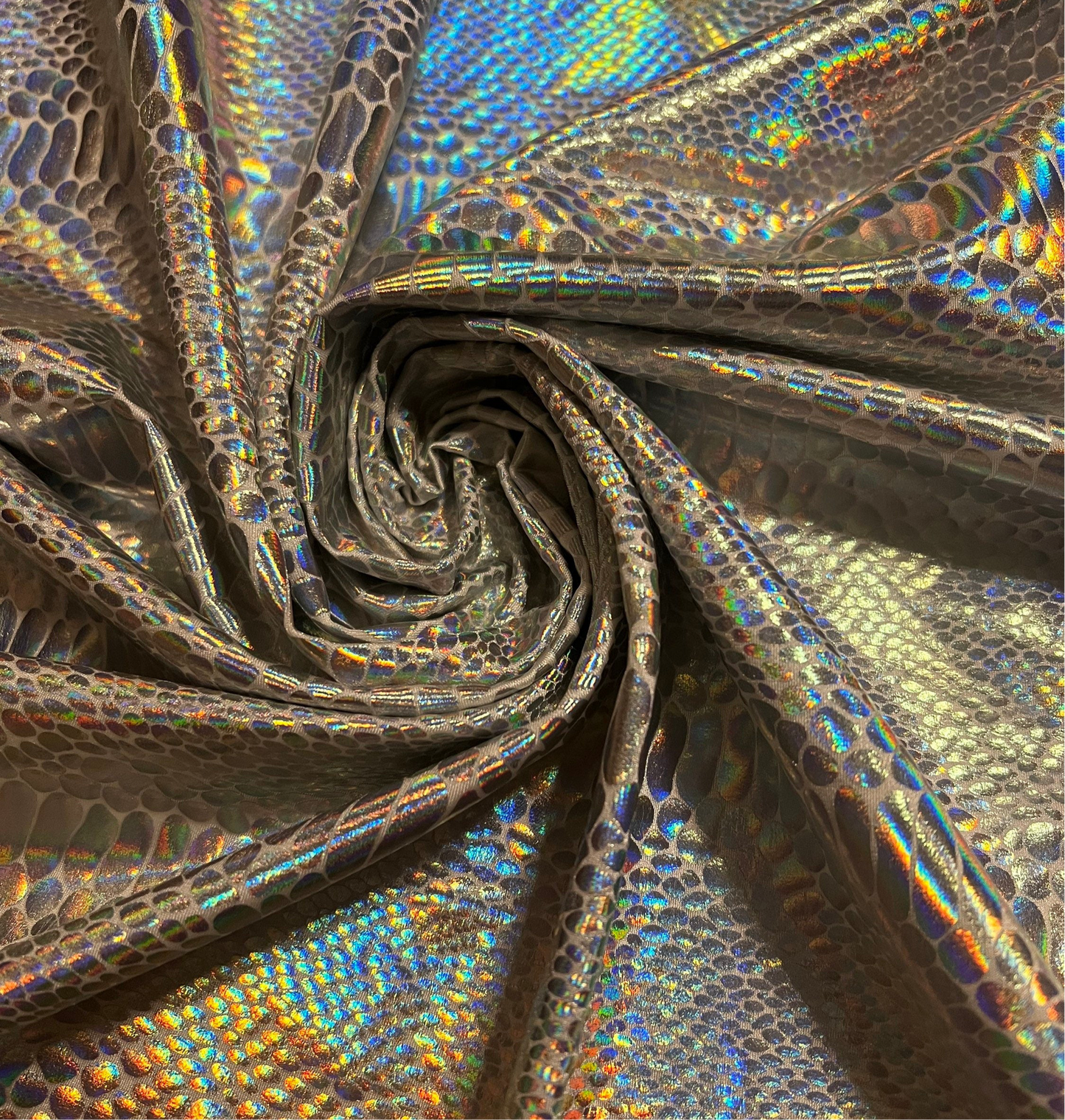 New iridescent foil snake skin design nylon spandex 4-stretch 58/60”sold by the YD.ships worldwide from Los Angeles California USA.