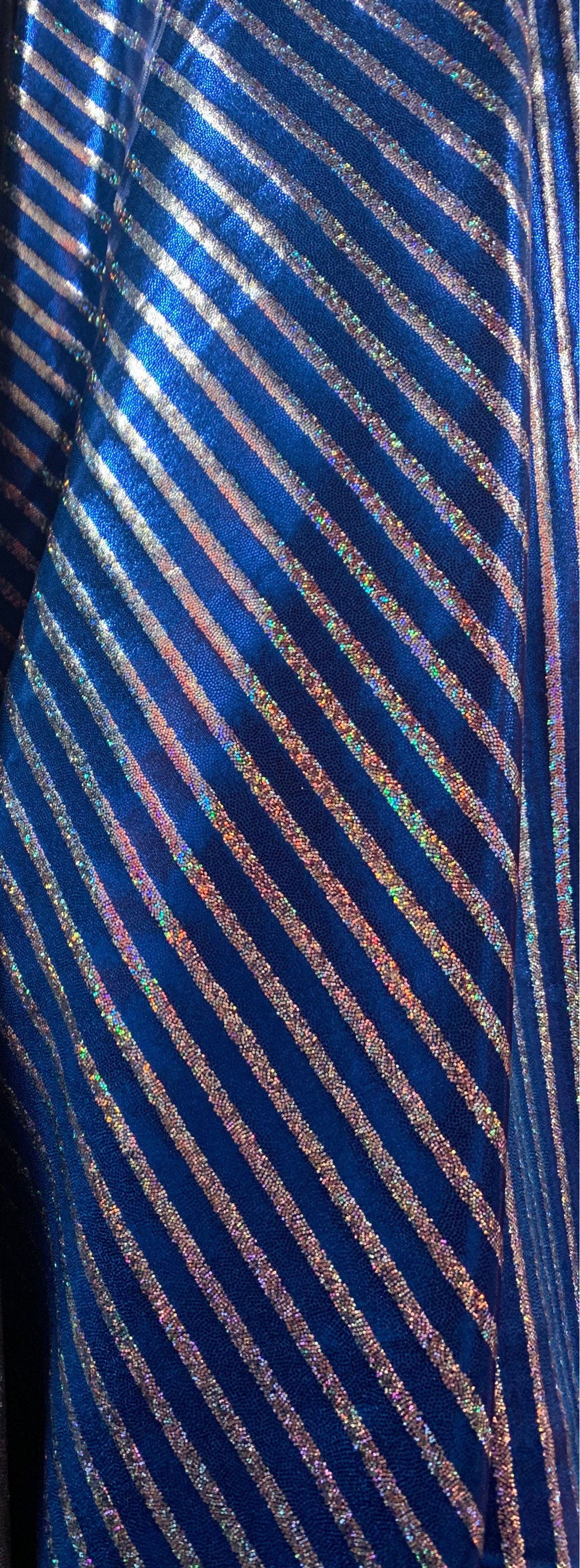 Metallic spandex stripes design w/ hologram foil 4-Stretch 58/60”sold by the YD. ships worldwide from Los Angeles California USA.