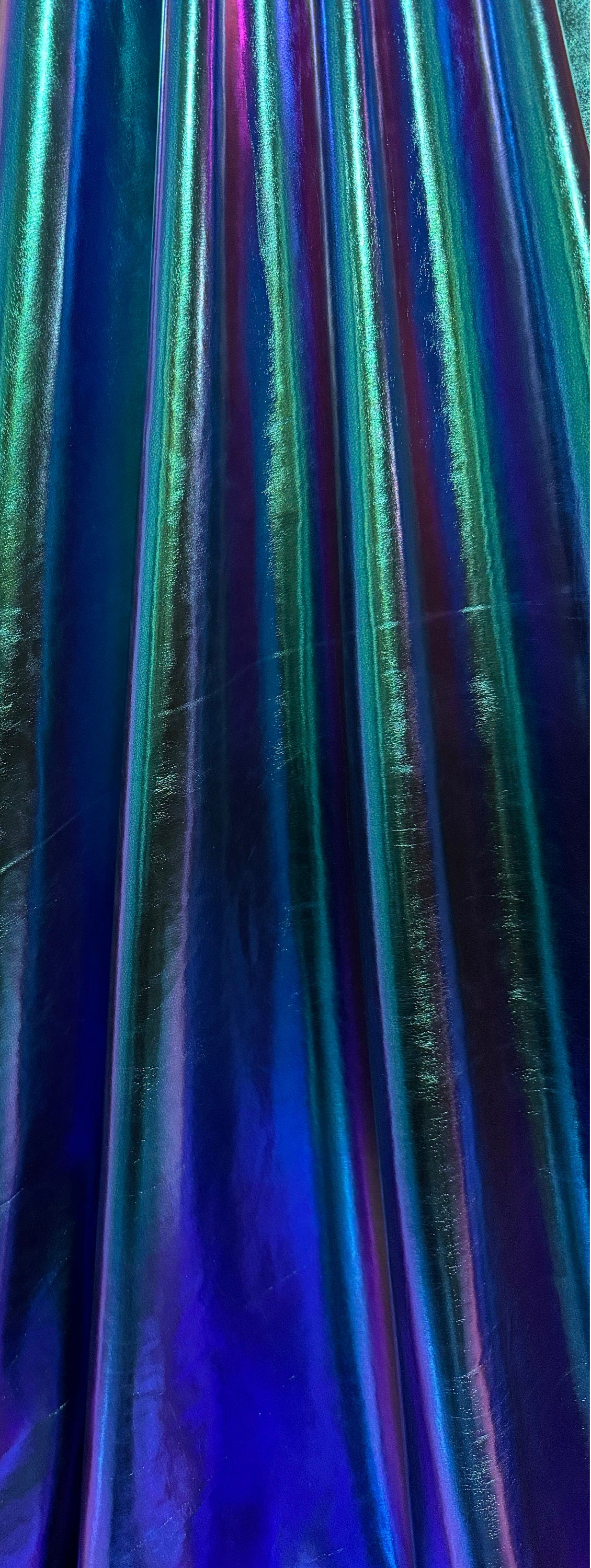 New iridescent all over foil design metallic nylon spandex 4-stretch 58/60”Sold by the YD.Ships worldwide from Los Angeles California USA.